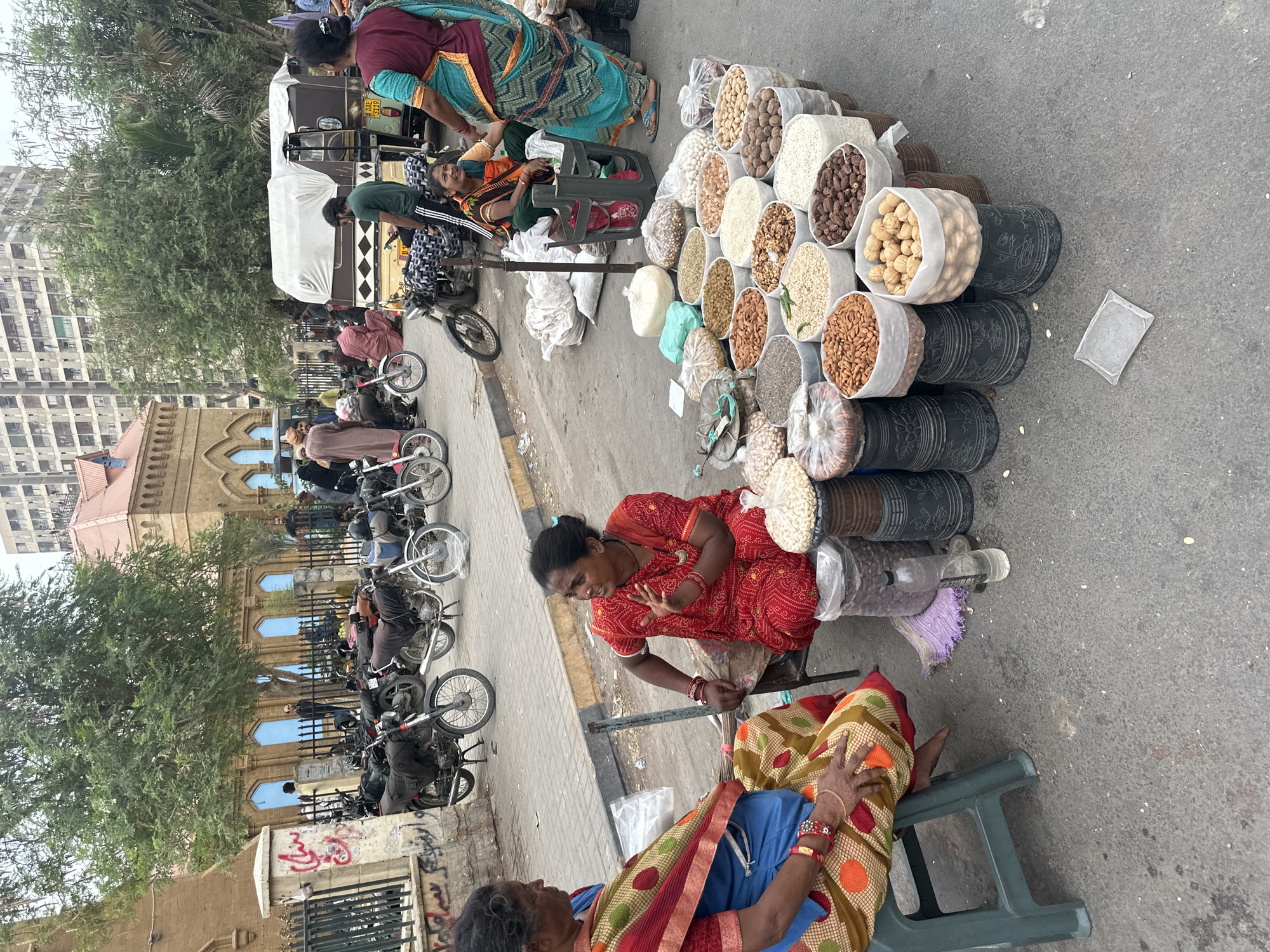 Nuts and dried fruit vendor working a Karachi street market