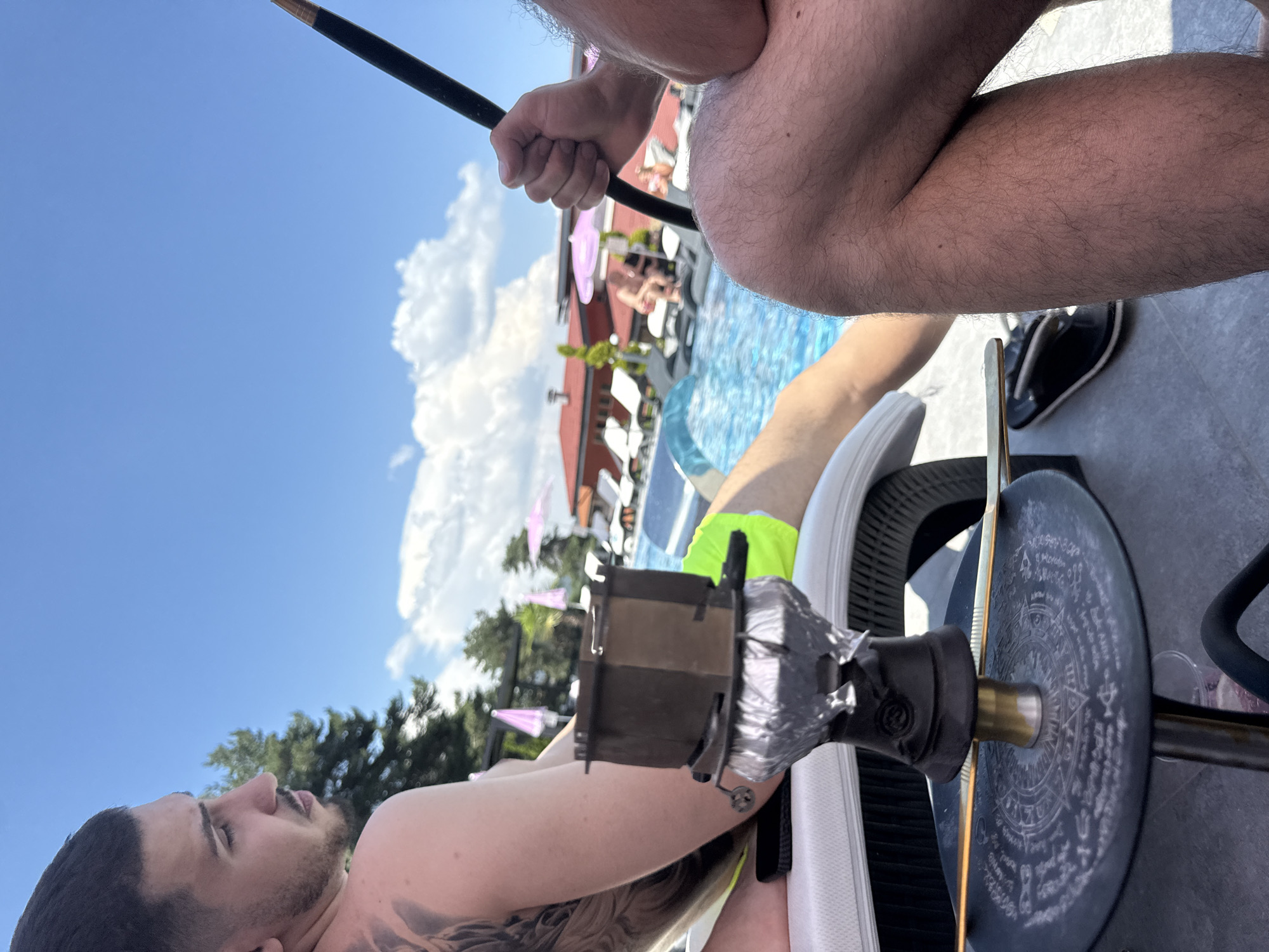 Poolside downtime at a Bulgarian resort on a sunny afternoon