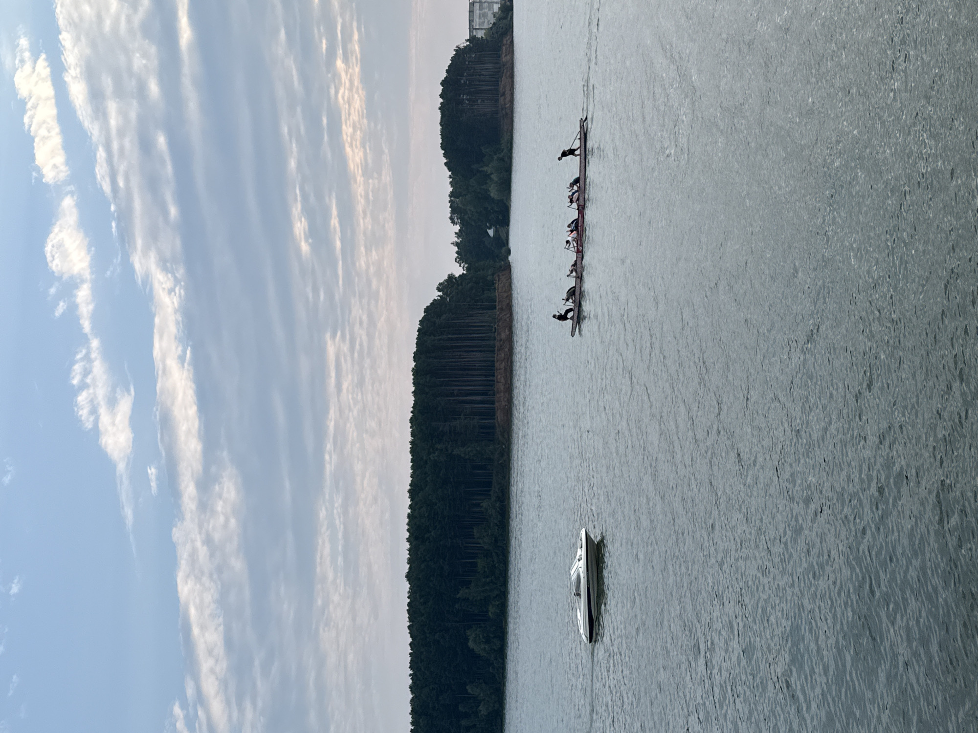 Afternoon on the Kama River: boats, fishing, and pine shores
