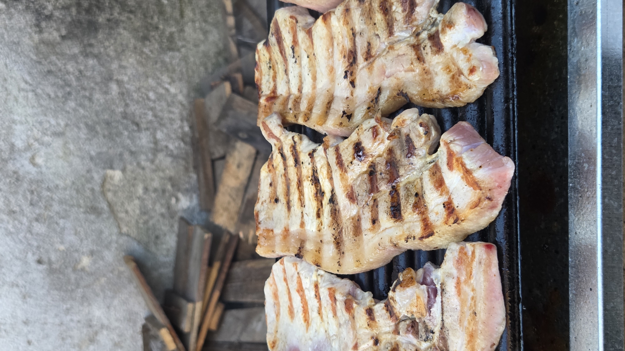 Outdoor grilling session captured in Bania, Bulgaria