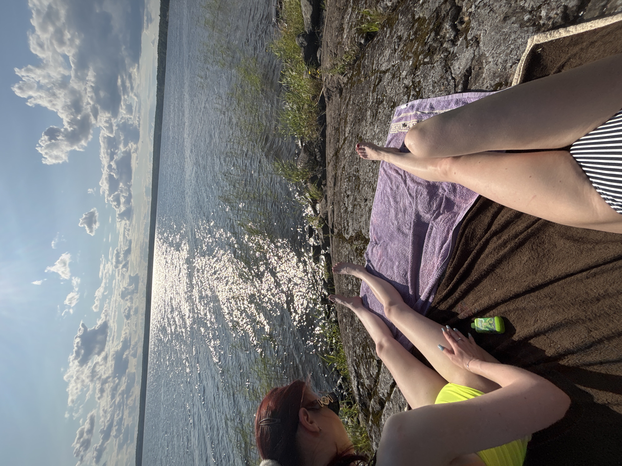 Lazy summer afternoon on a rocky Russian lakeshore