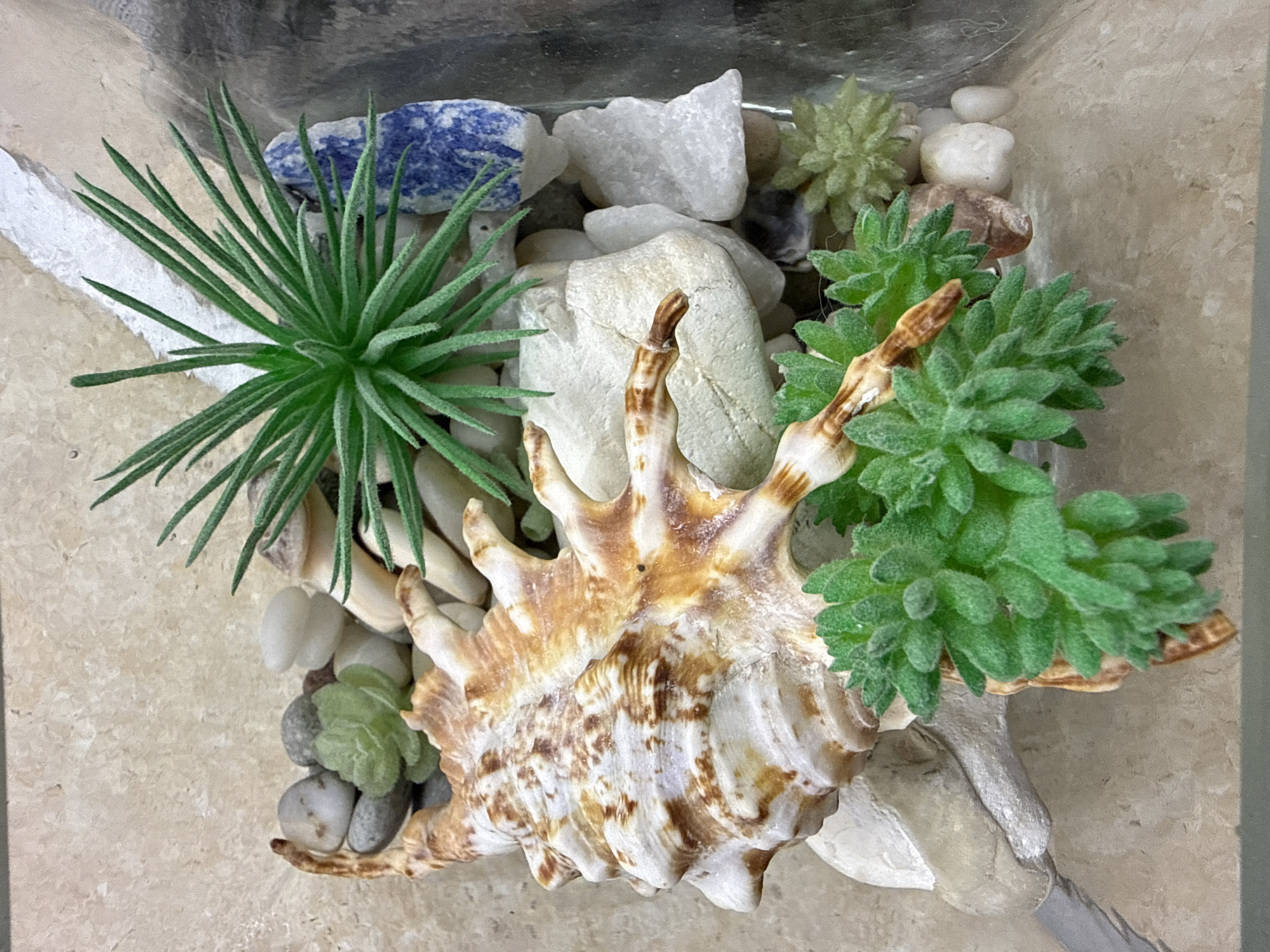 Decorative arrangements and personal items documented in Partenit, Ukraine