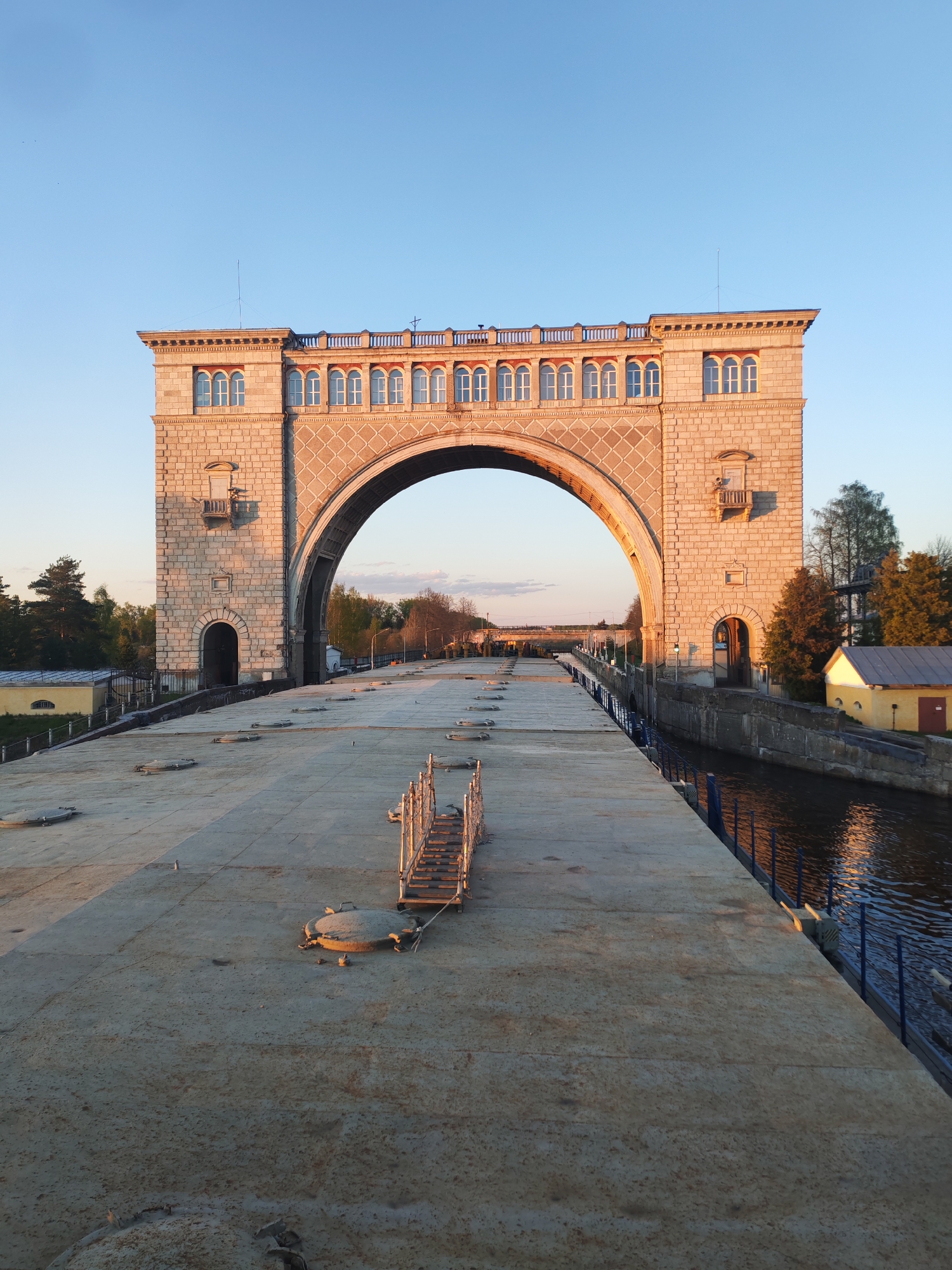 Stone arch structure documented over canal in Chelganovo, Russia