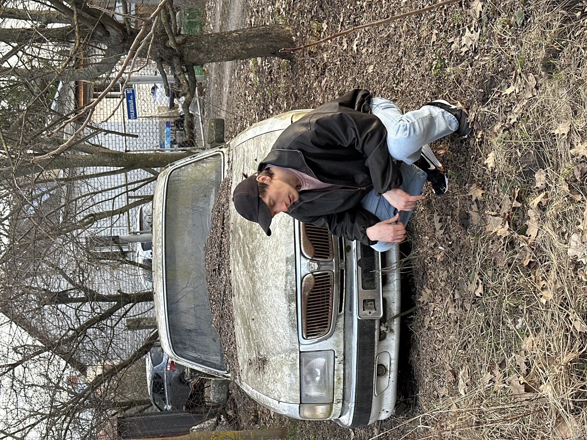 Young man spotted on vintage car hood in Kursk