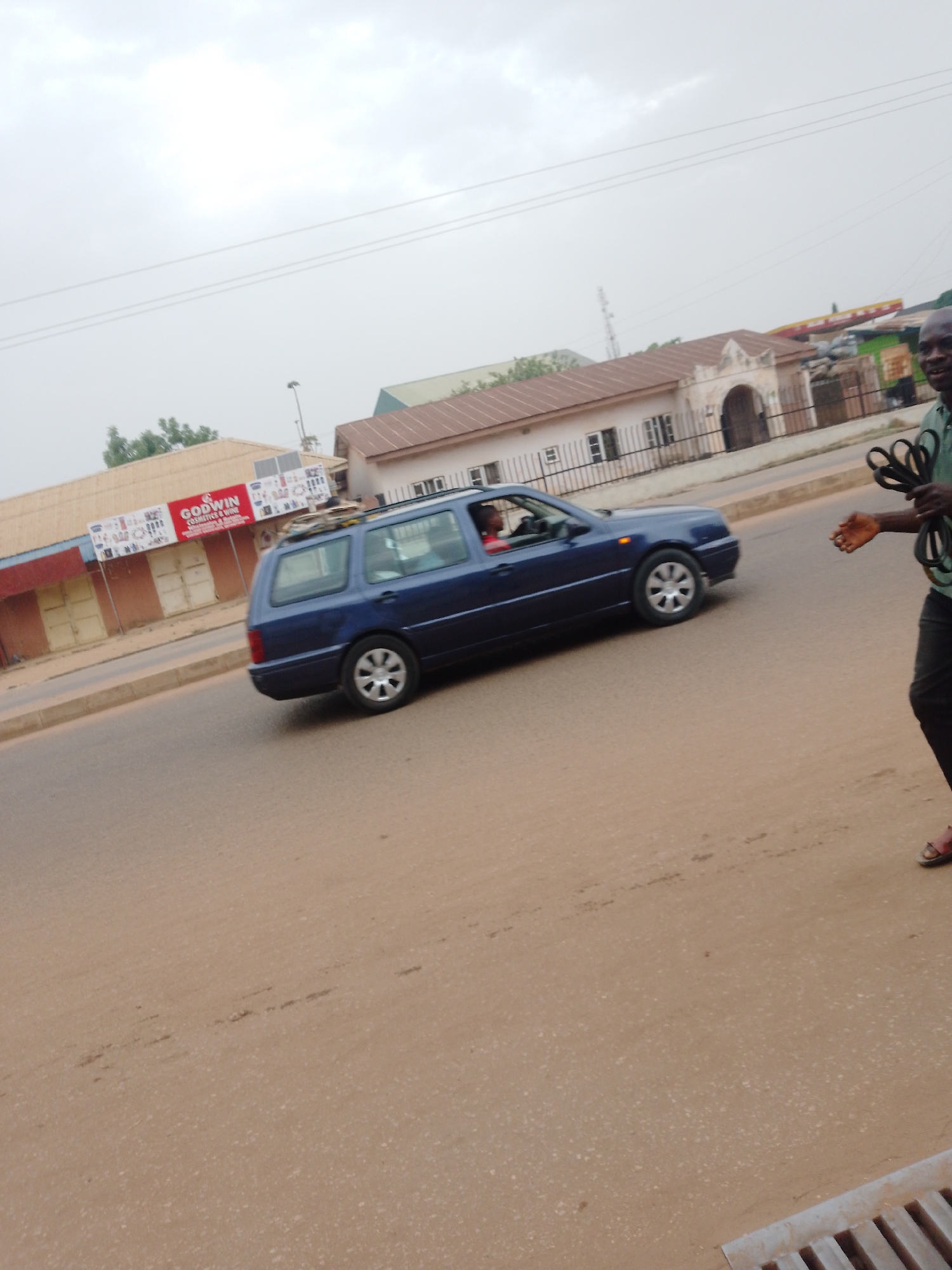 Morning street life documented in Nigerian neighborhoods
