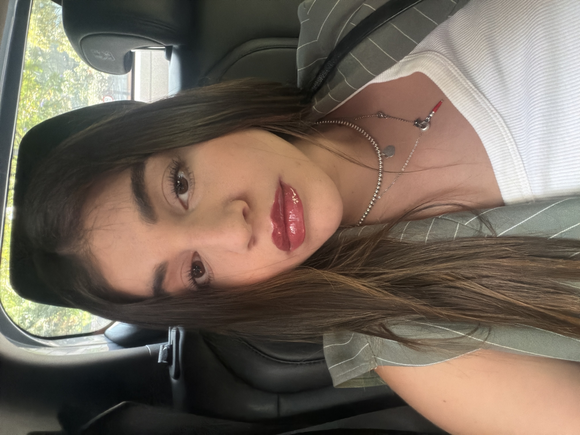 Woman Takes Selfies in Parked Car in Mexico City