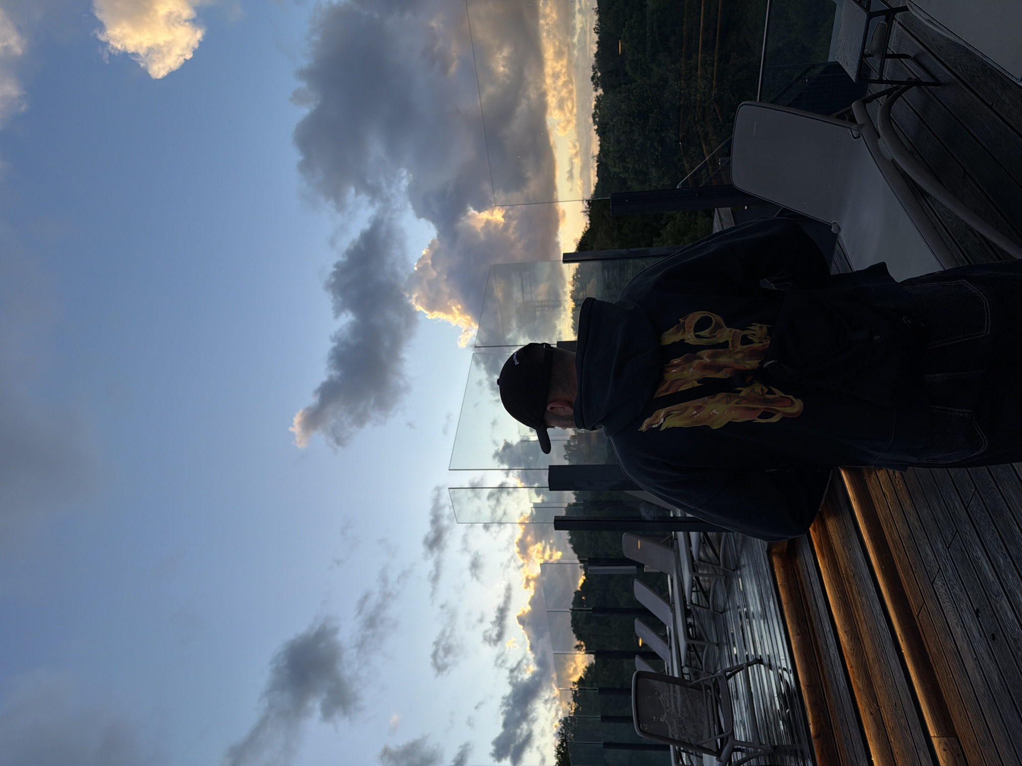 Sunset rooftop terrace overlooking Kołobrzeg cityscape