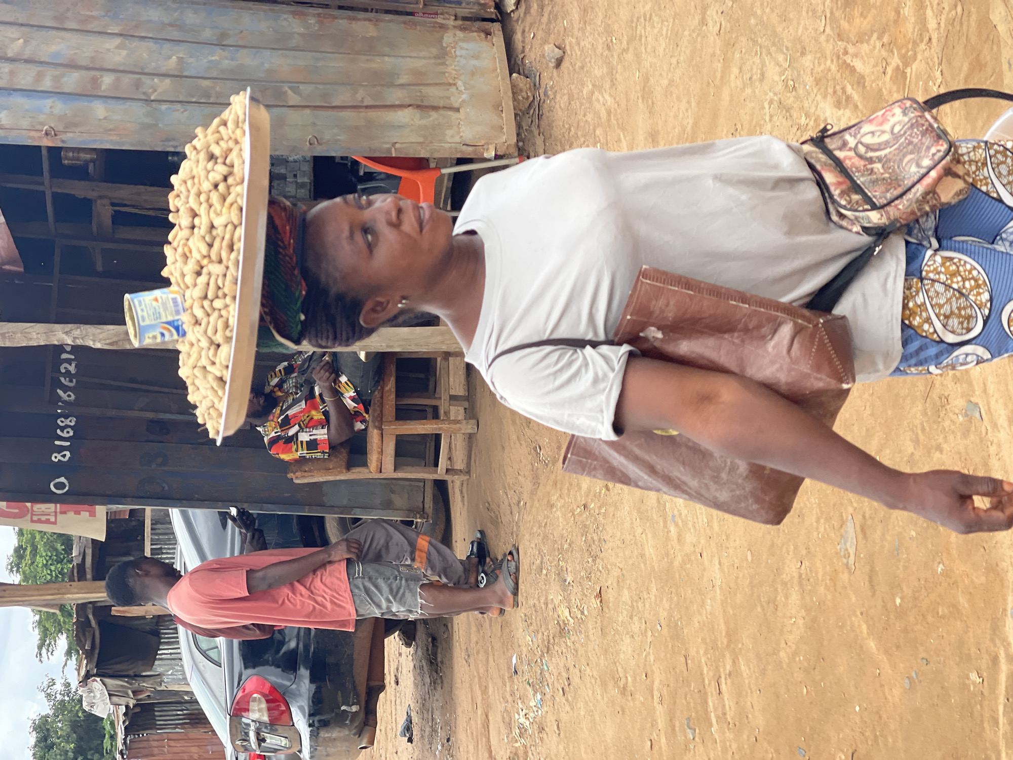 Peanut sellers and street traders at work in Abuja