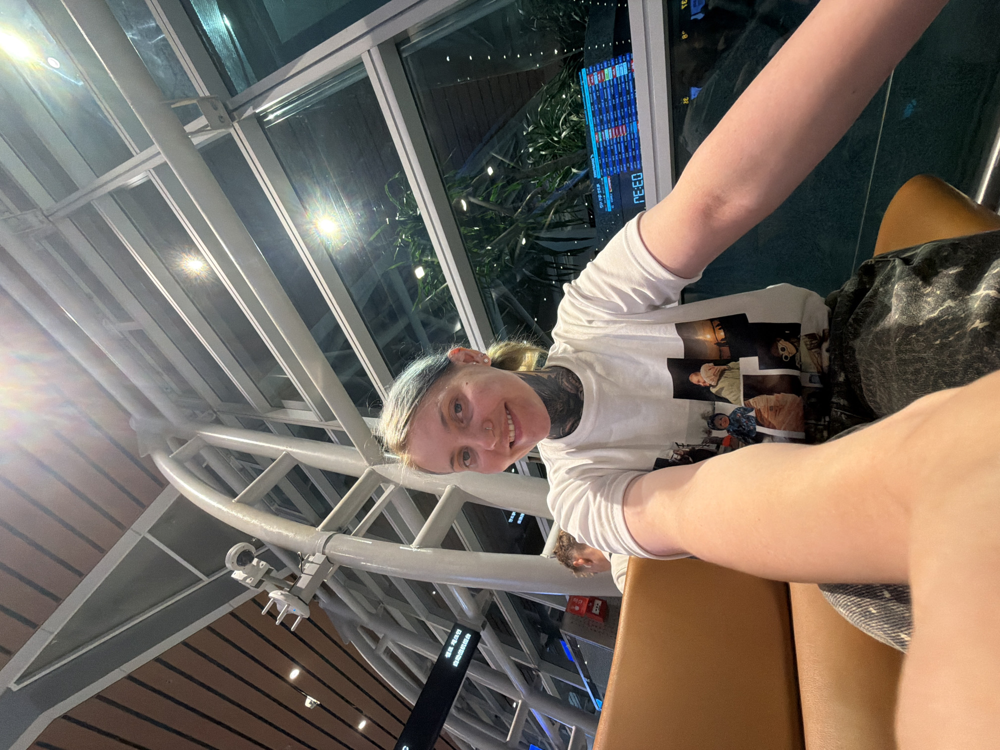 Family travels through Da Nang airport terminal evening