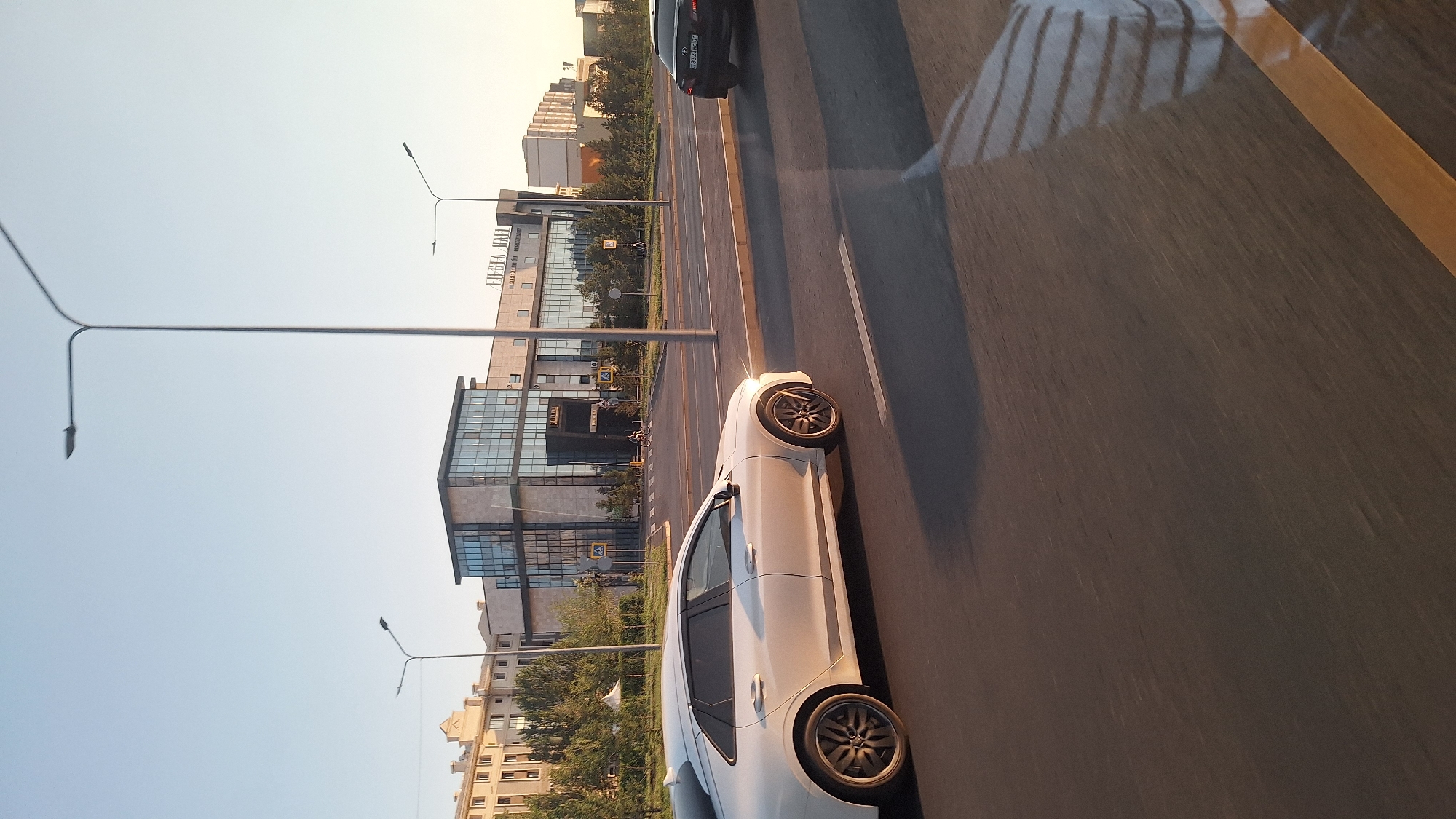 Street and transit scenes across central Astana