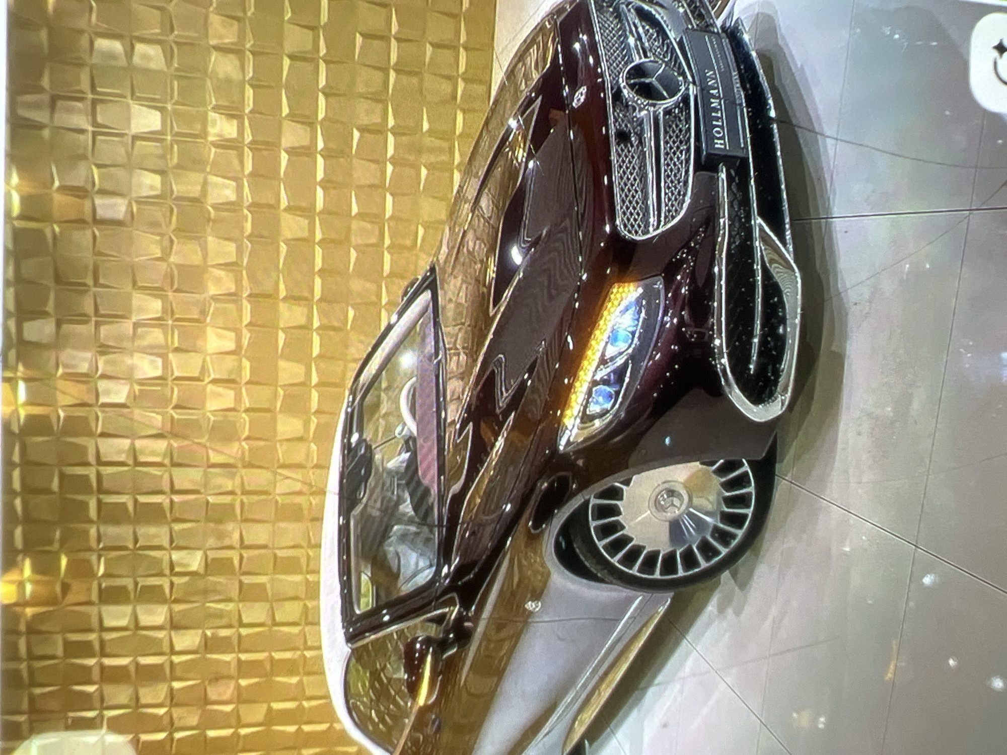 Scattered luxury car and lifestyle shots with no clear thread