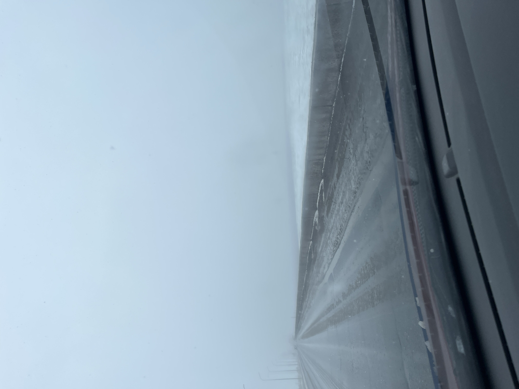 Wet road conditions documented in Chaikovsky, Russia
