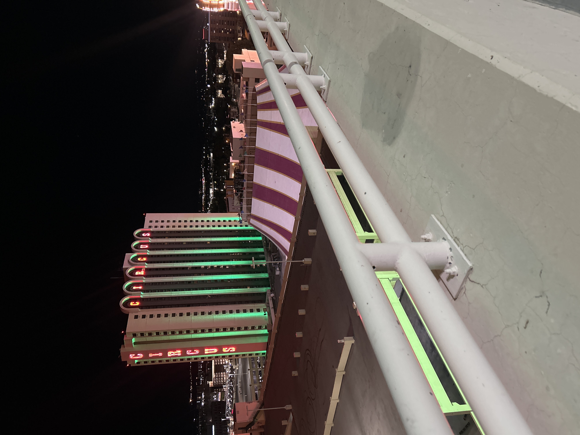 Nighttime documentation of Reno casino district from multiple elevated viewpoints