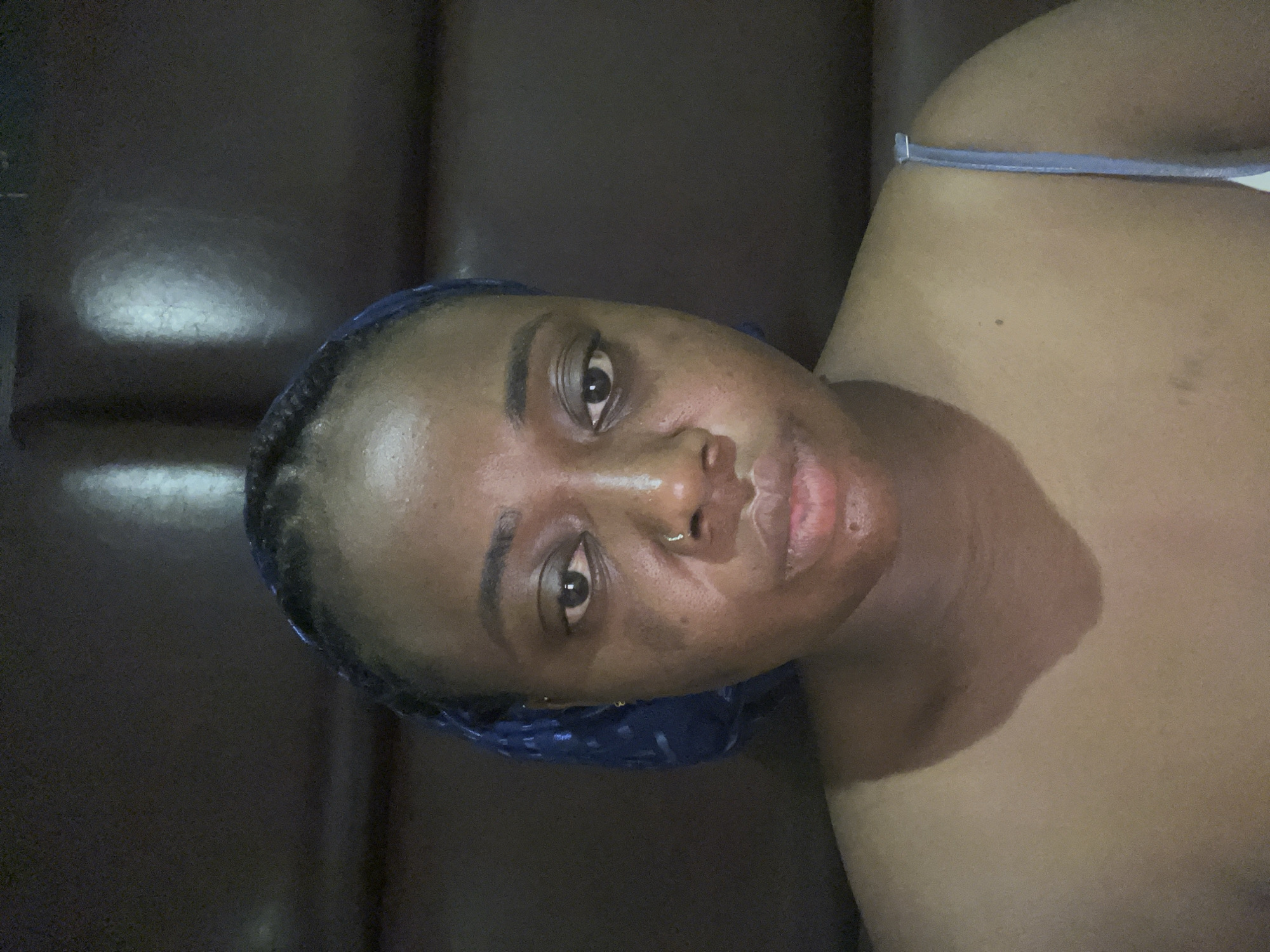 Woman captures selfie session in Abuja home setting