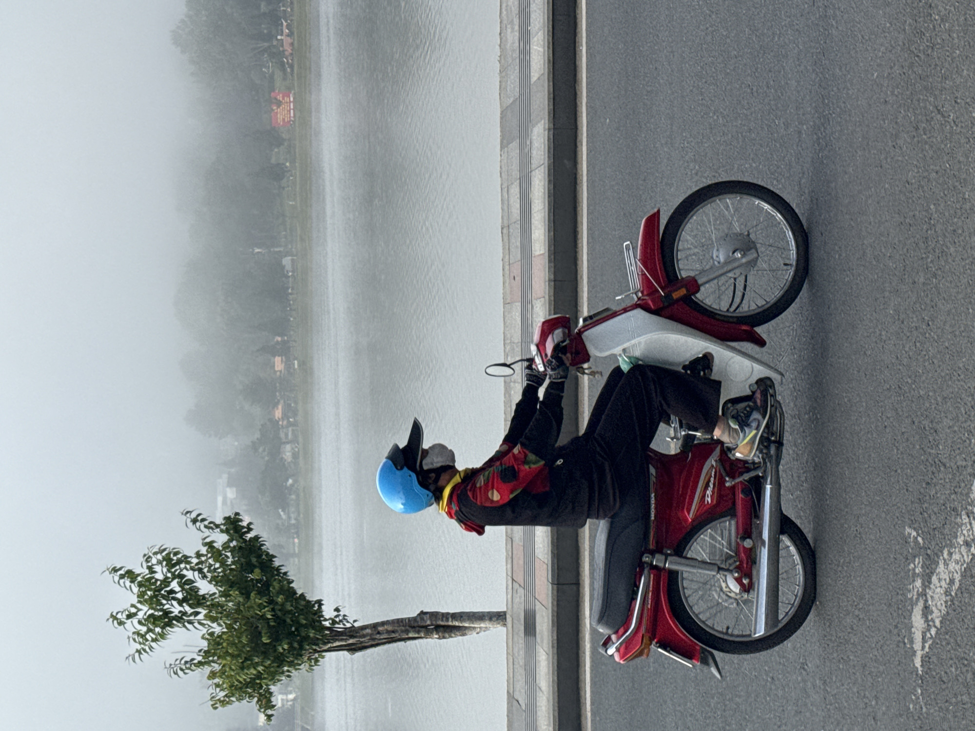 Misty morning activity along Da Lat's Xuan Huong Lake