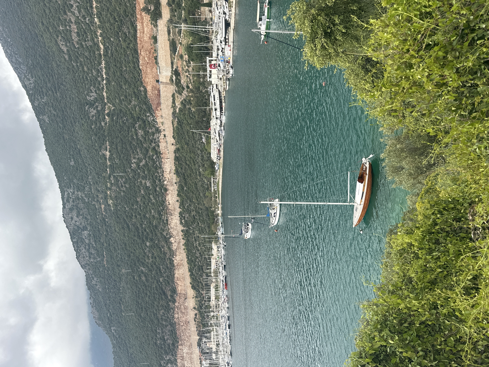 Afternoon leisure moments captured in scenic Kaş, Turkey marina