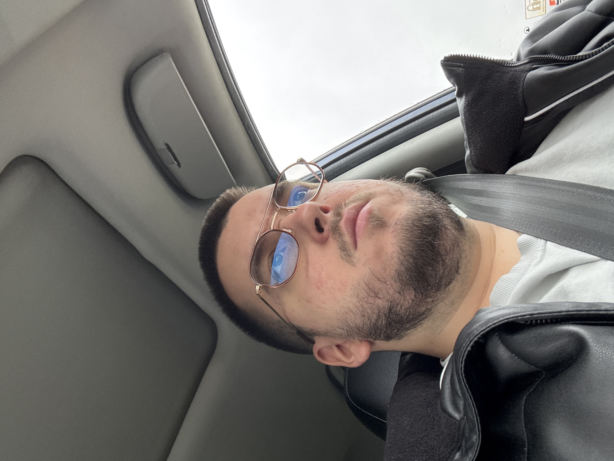 Man in leather jacket observed in car in Sofia