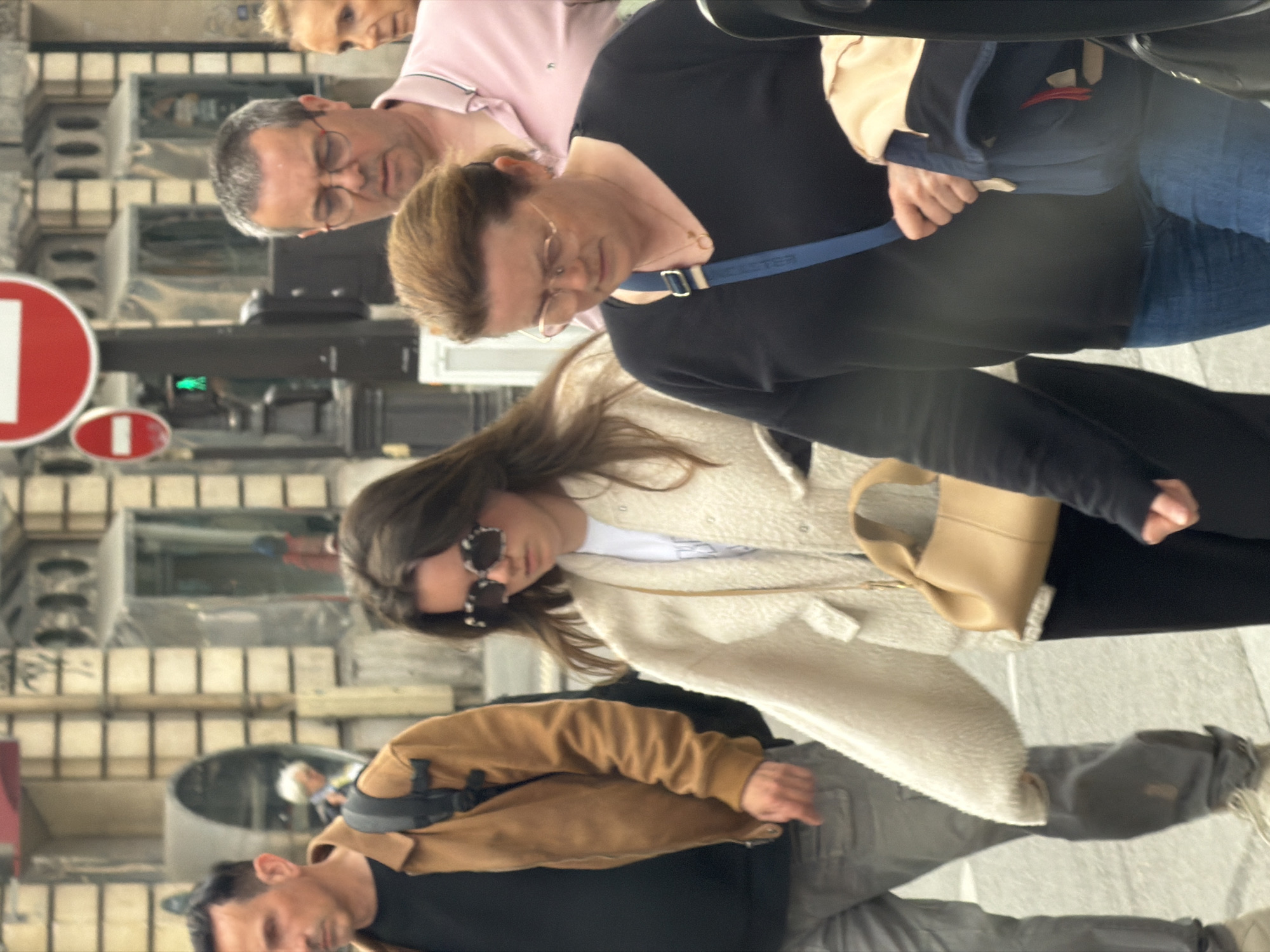 Ordinary street life documented across Paris neighborhoods Friday afternoon