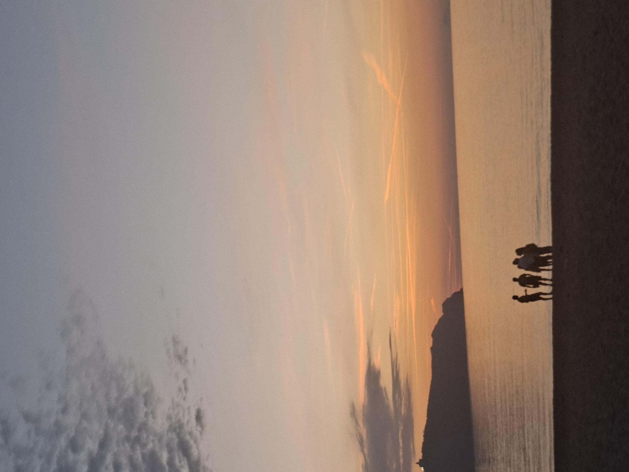 Sunset scene with silhouettes captured by witnesses
