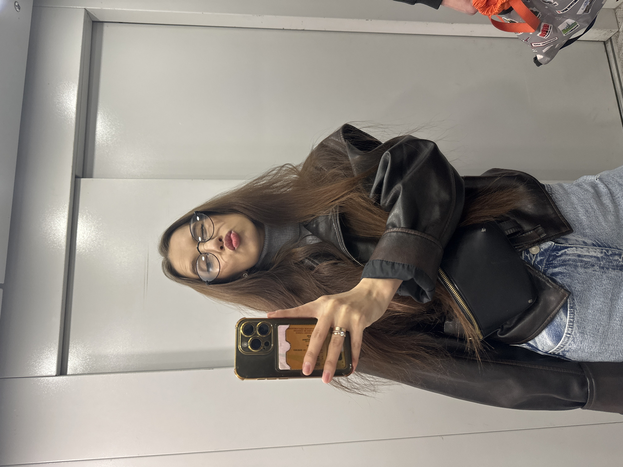 Woman Takes Selfies in Yekaterinburg Elevator