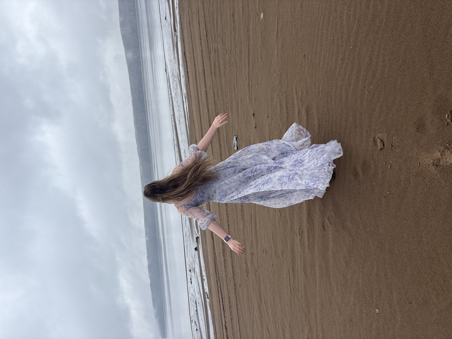 Person enjoys quiet beach time in Chaikovsky, Russia