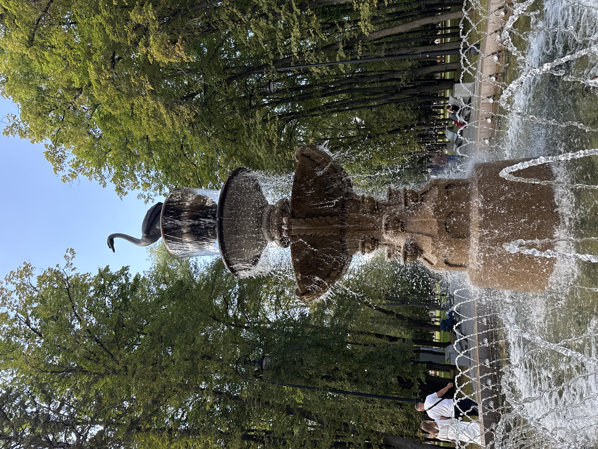 Swan-topped fountain runs in a Khimki park