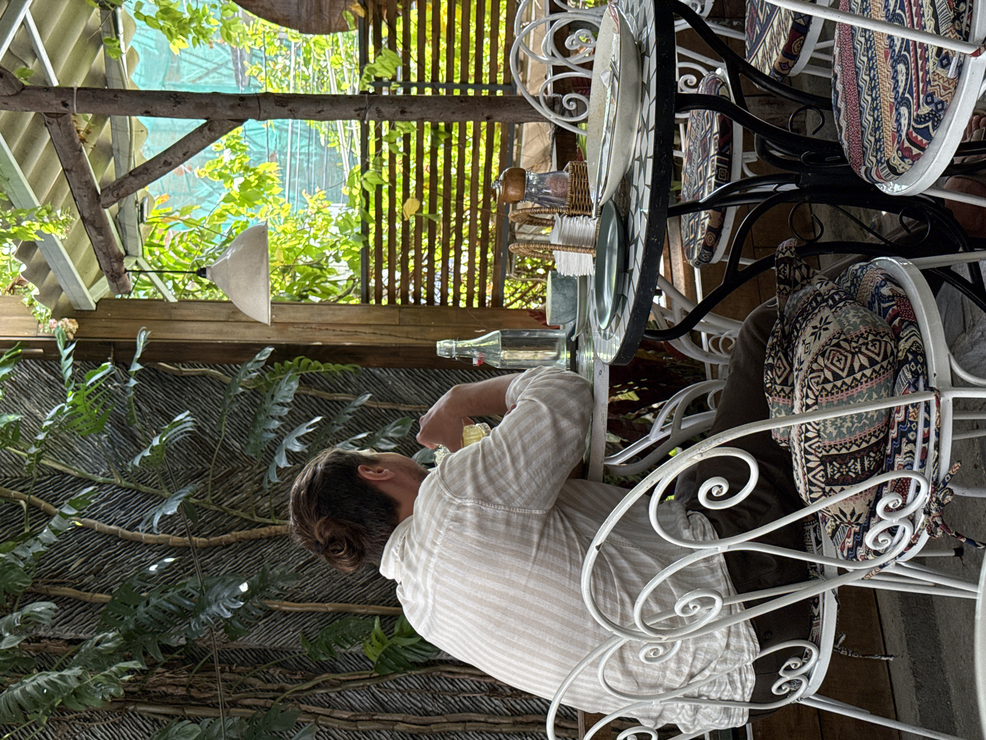 Relaxed morning at a mosaic-table café in Nha Trang