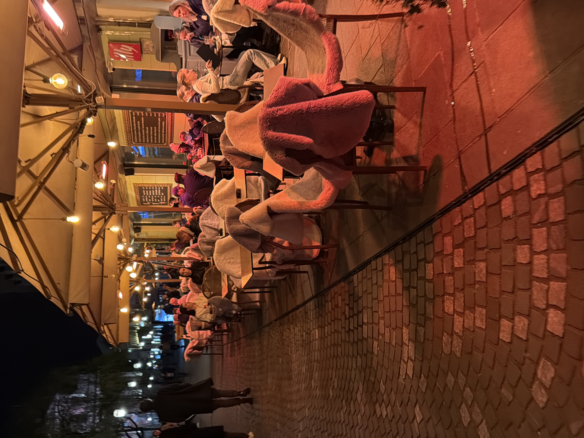 Evening dining scene captures Ljubljana's illuminated street cafes