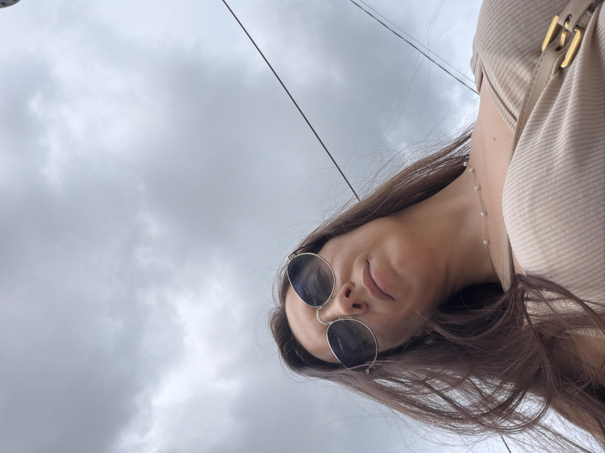 Quick low-angle portrait series on a cloudy Tujmazy street