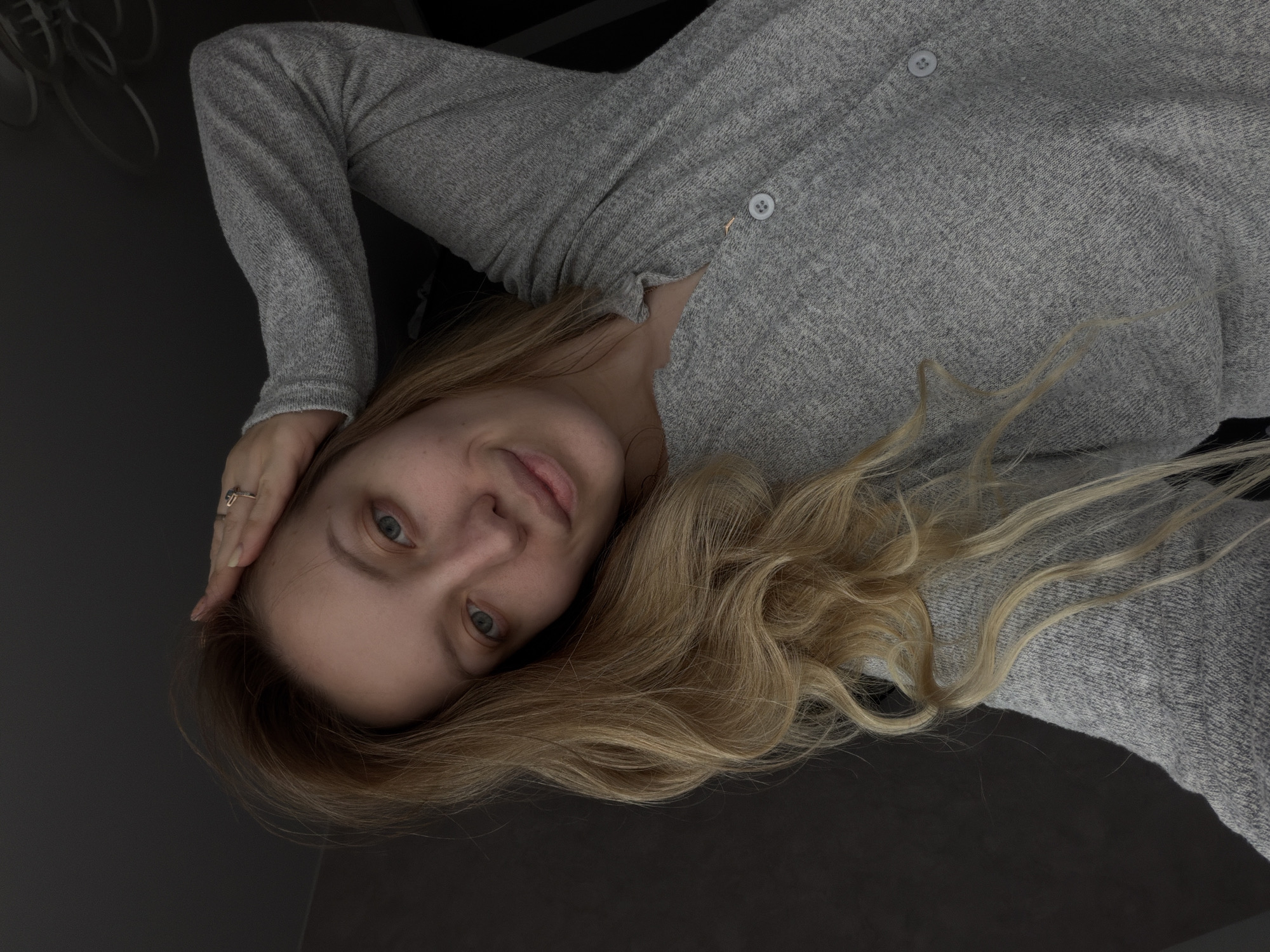 Indoor moments captured in Reshetnikovo: resting woman, sprouting plant