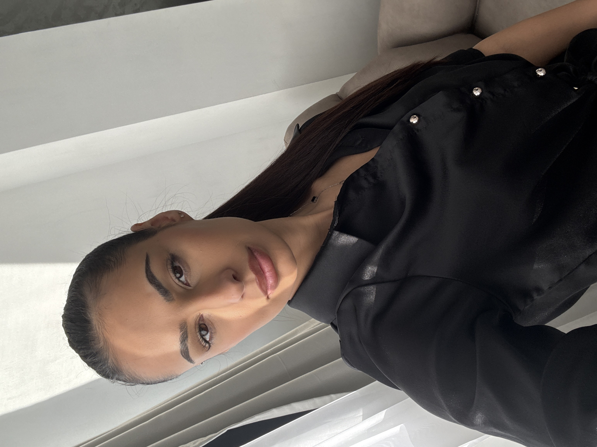 Woman poses for photos in black outfit, Sofia