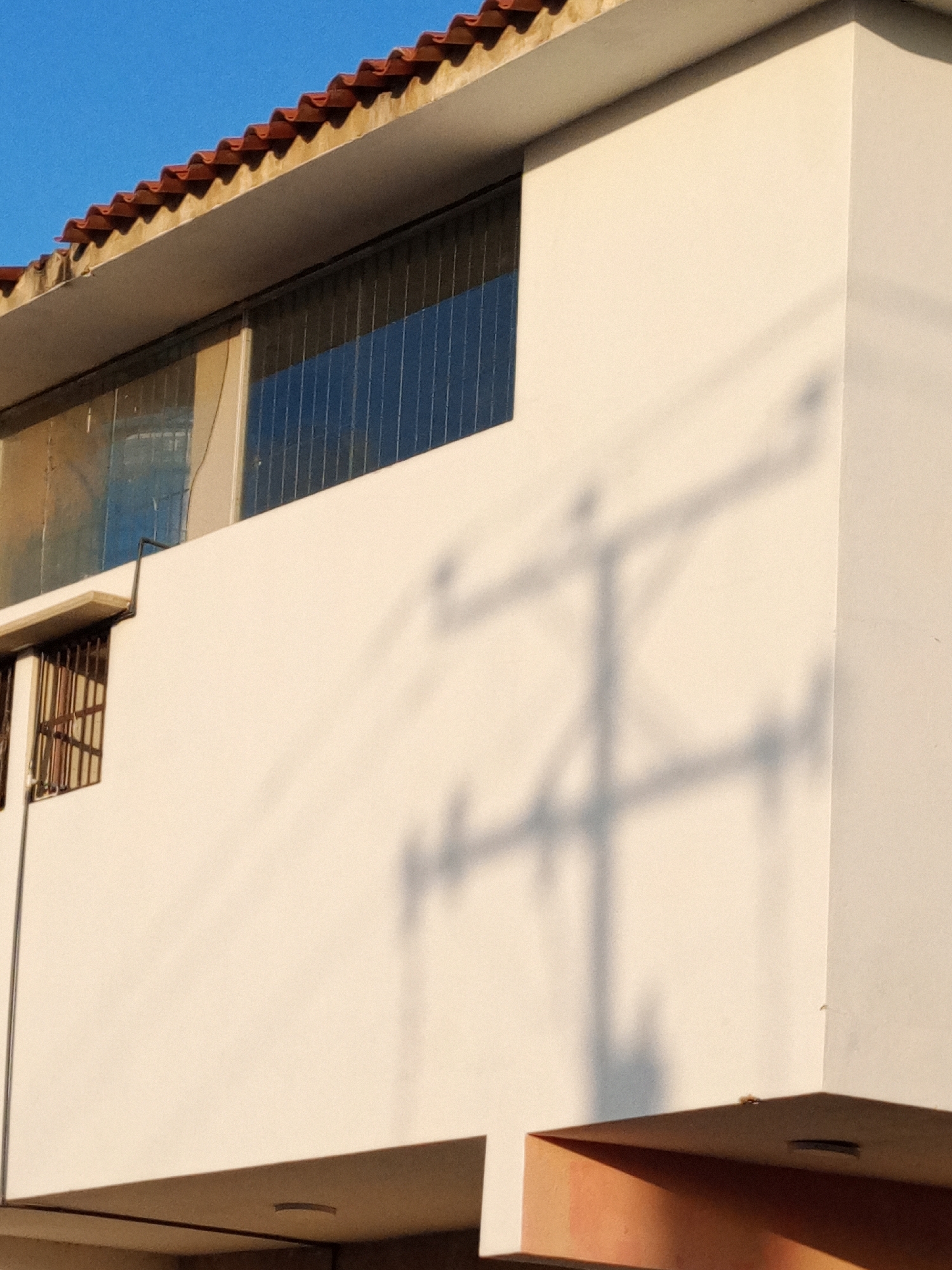 Clear skies and urban infrastructure documented in brief photo sequence
