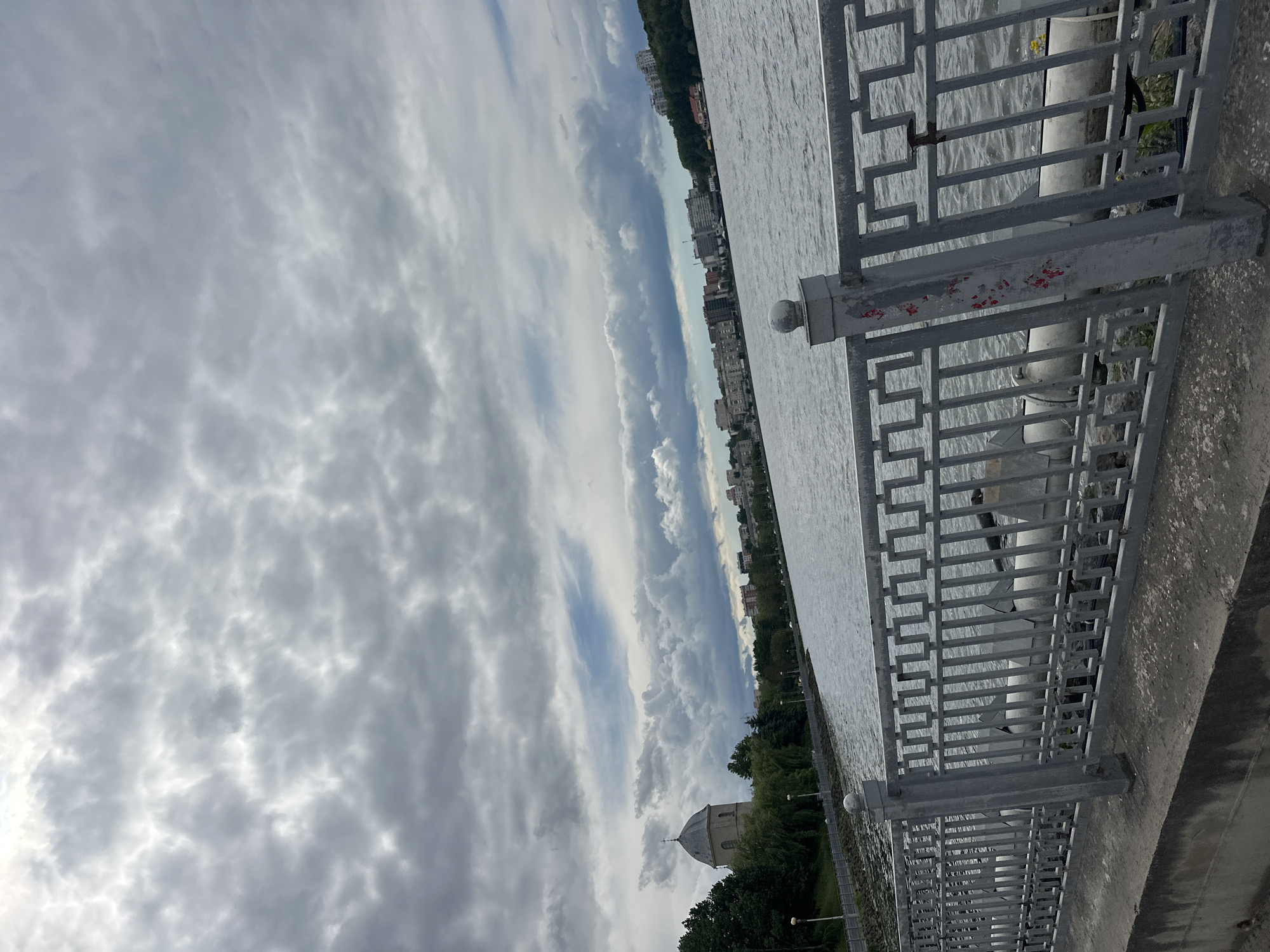 Hour-long documentation of Ternopil Pond waterfront under overcast skies