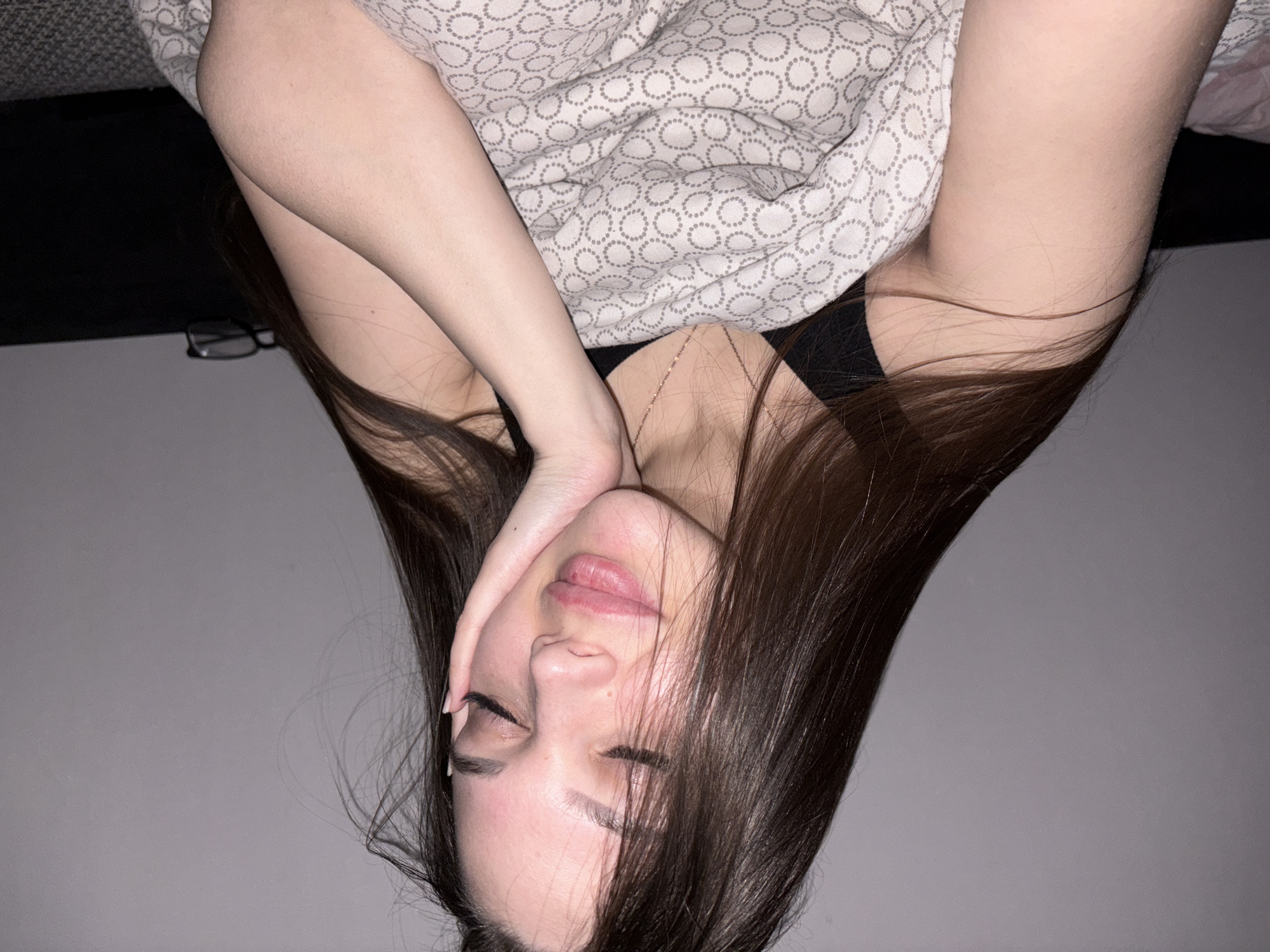 Woman observed resting upside down indoors in Chaikovsky, Russia