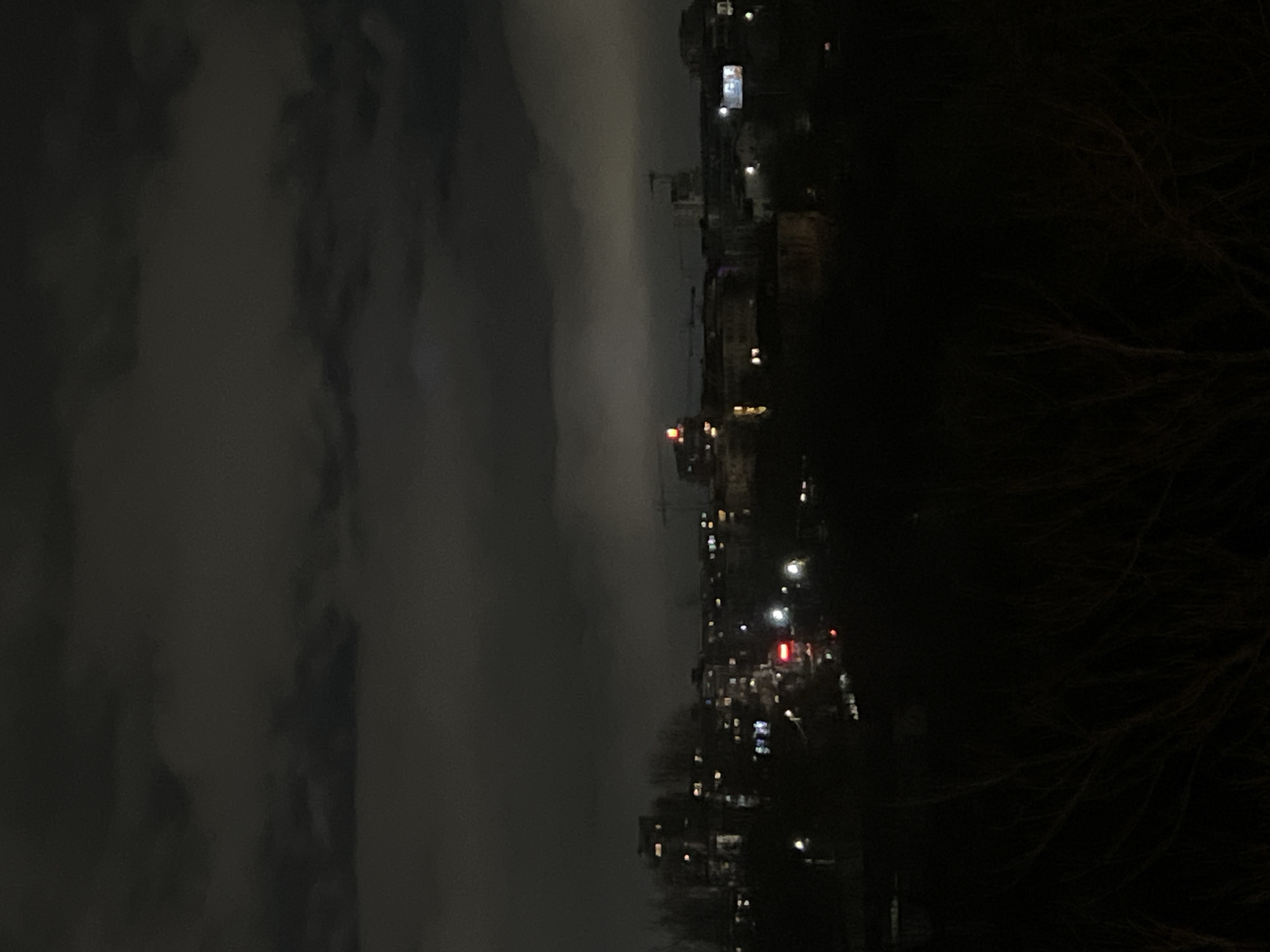 Sofia cityscape illuminated under cloudy night sky