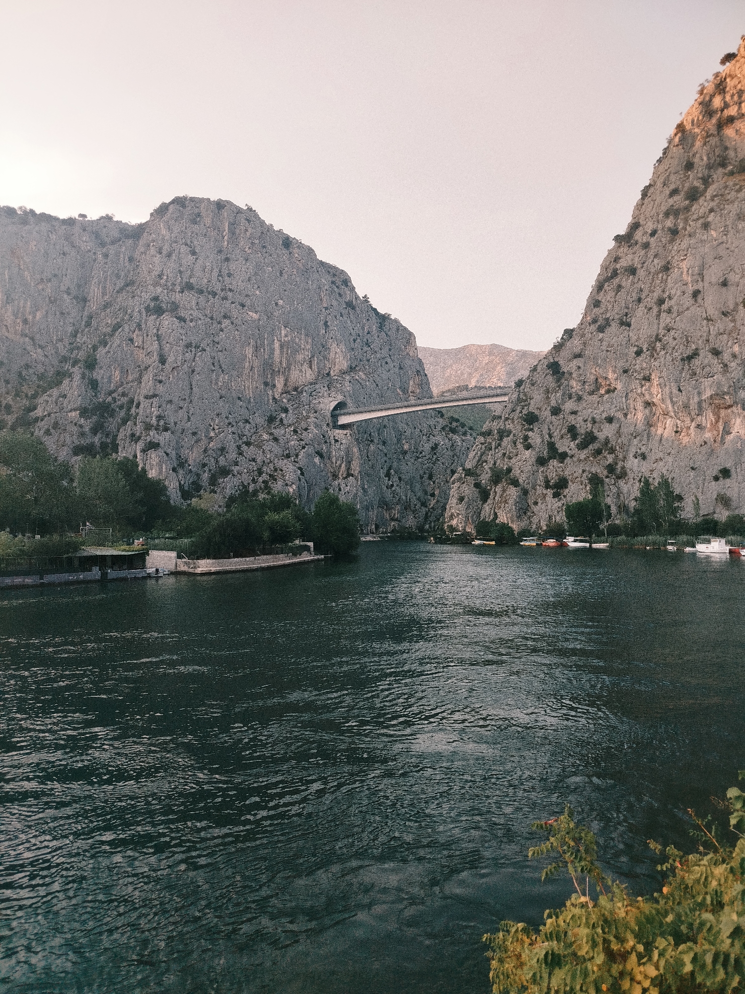 Omiš, Croatia: canyon, cliffs, waterfront, and fortress at golden hour