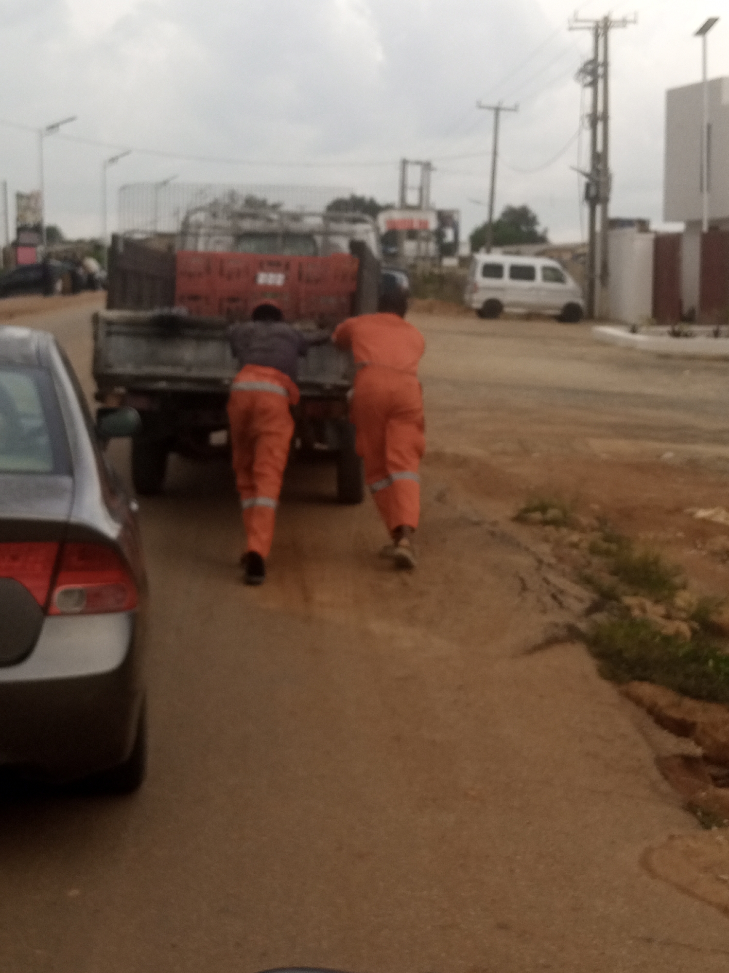 Manual labor and street commerce in Gura Top, Nigeria