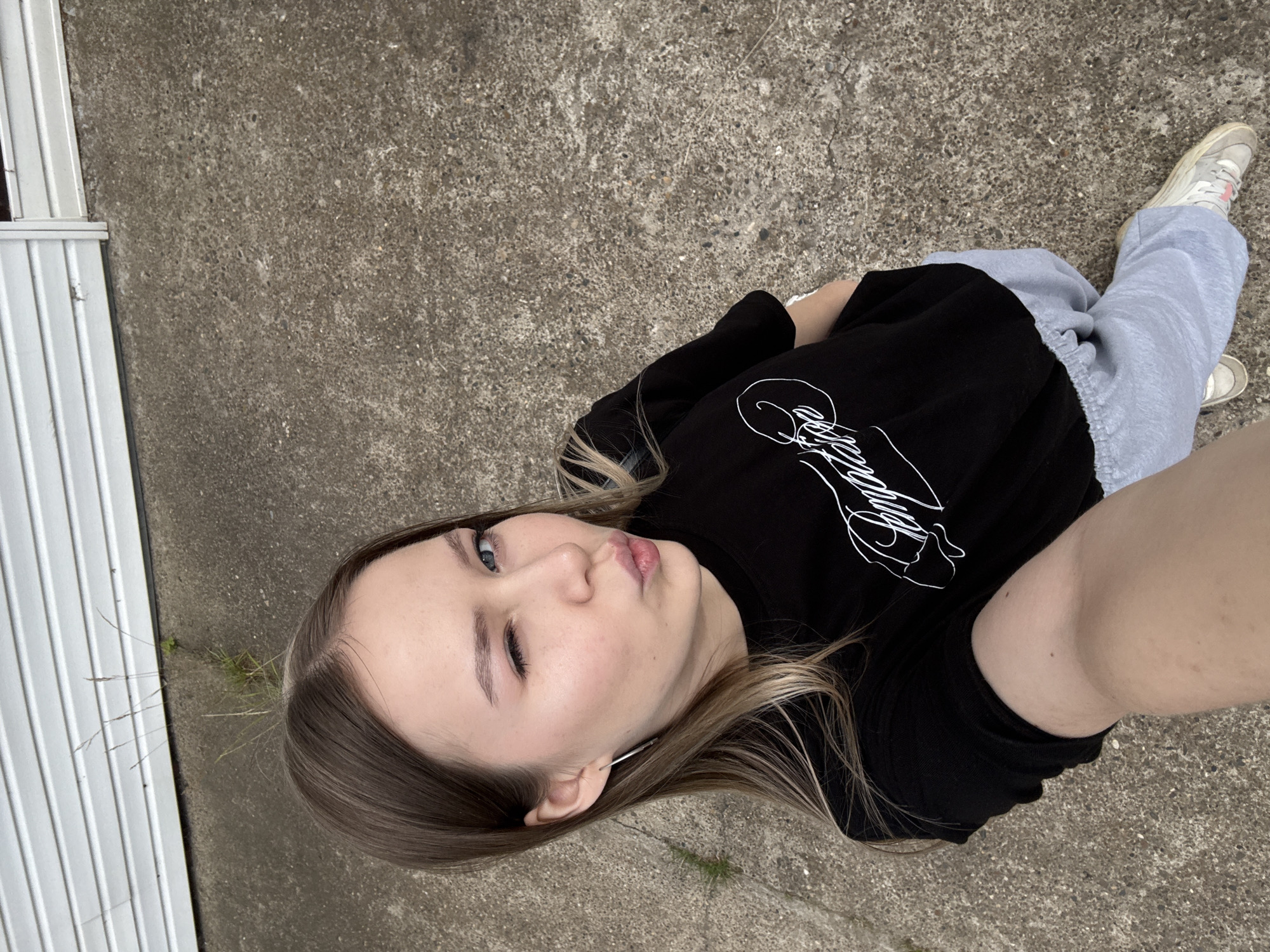 Friends in matching black tees hang out across Chaikovsky