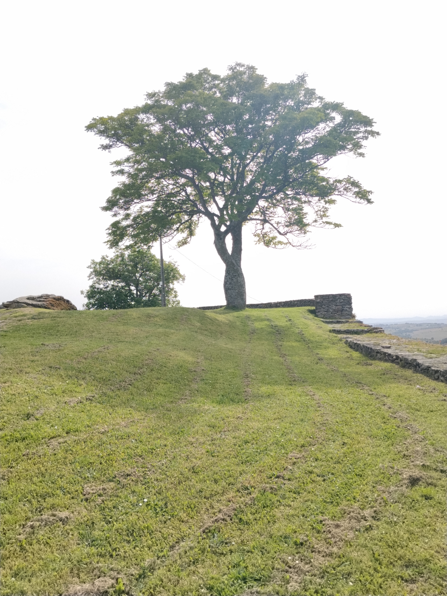 Tourist documents historic landmarks across Mogadouro, Portugal
