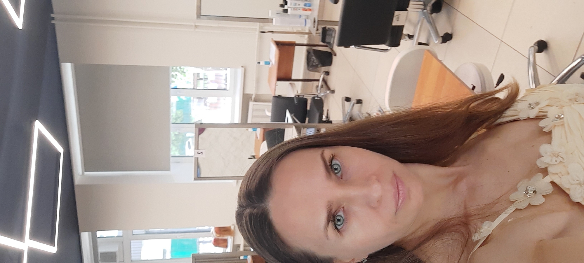 Woman takes selfies at Moscow beauty salon