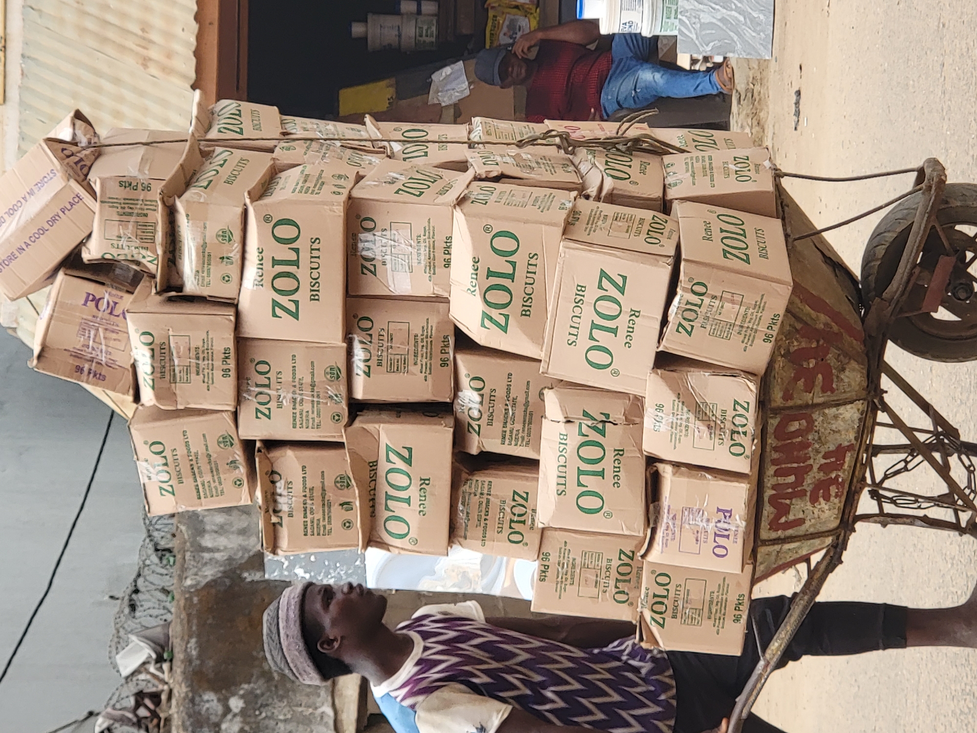 Daily street commerce and transportation in Maiburiji, Nigeria
