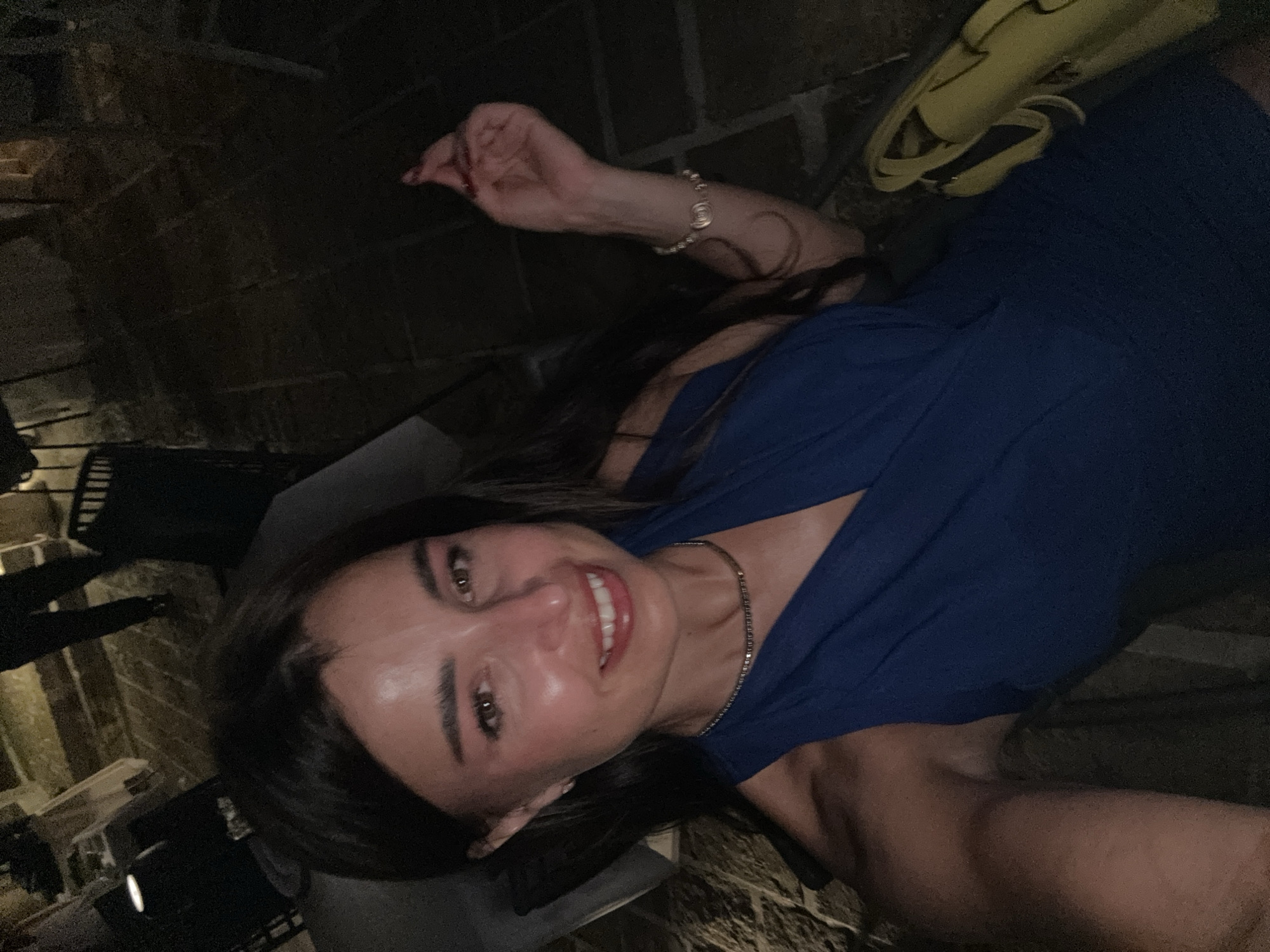 Night out at a stone courtyard restaurant with a seafood spread