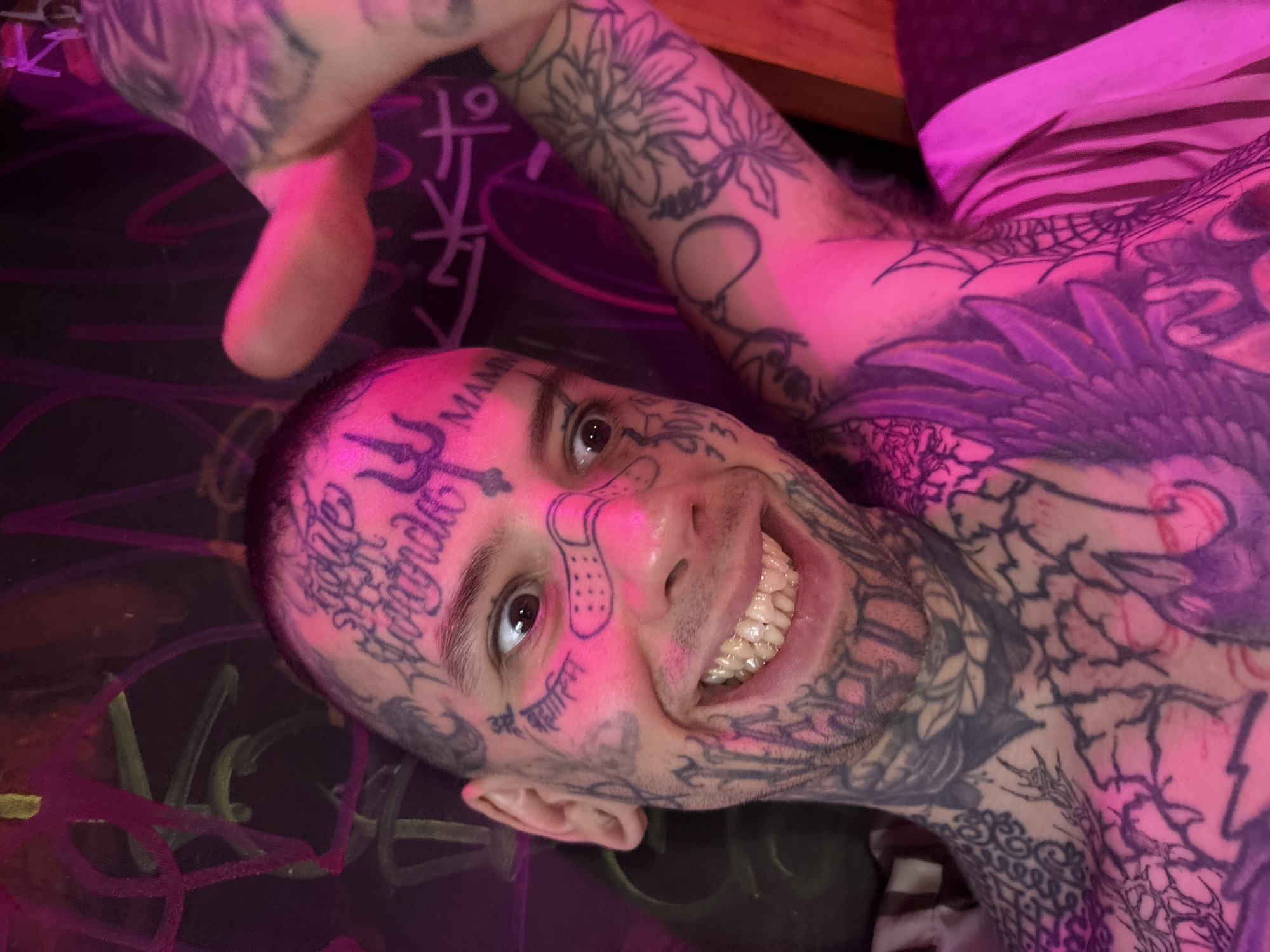 Heavily tattooed individuals photographed together in Buenos Aires