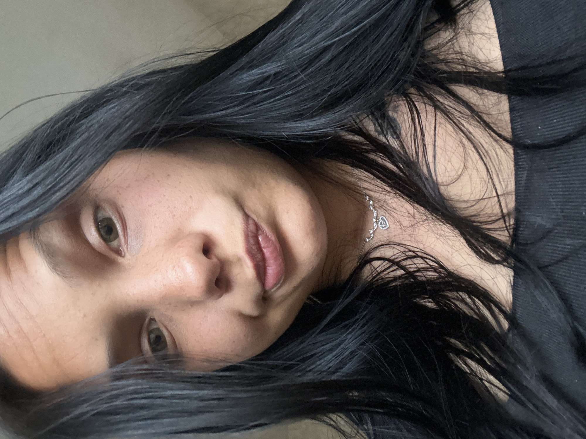 Woman photographed wearing heart necklace in Sofia