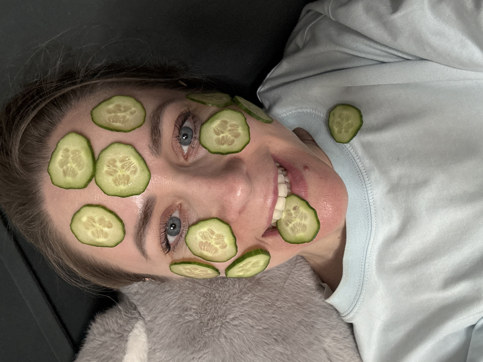 Woman enjoys cucumber facial treatment in Chaikovsky, Russia