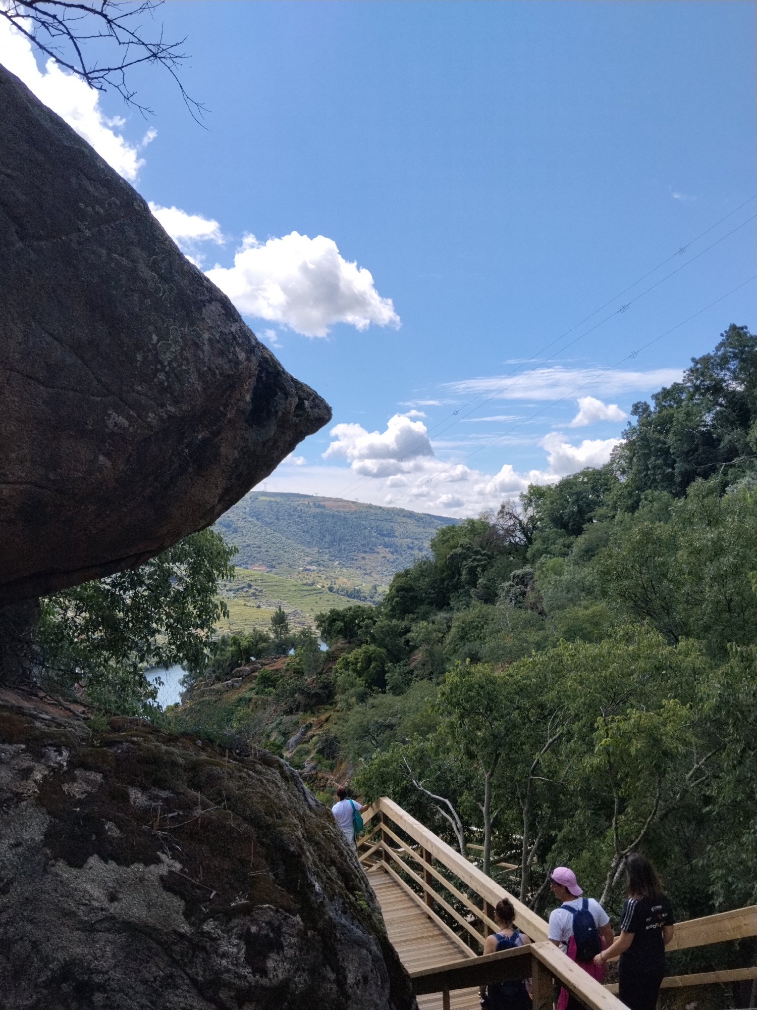 Tourist explores Douro River walkways and waterfalls in Alijó
