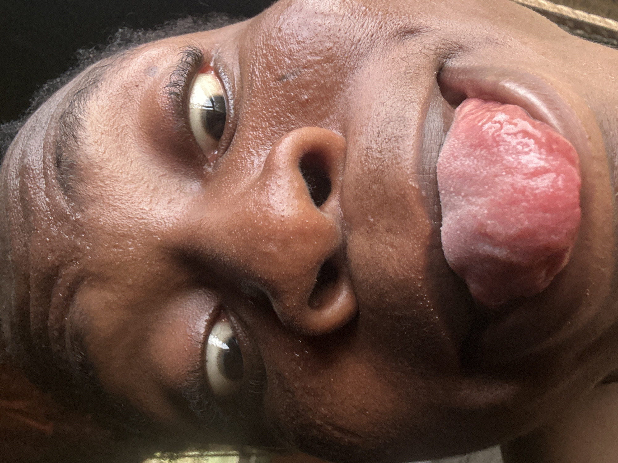 Person captured singing or shouting in animated close-up photographs