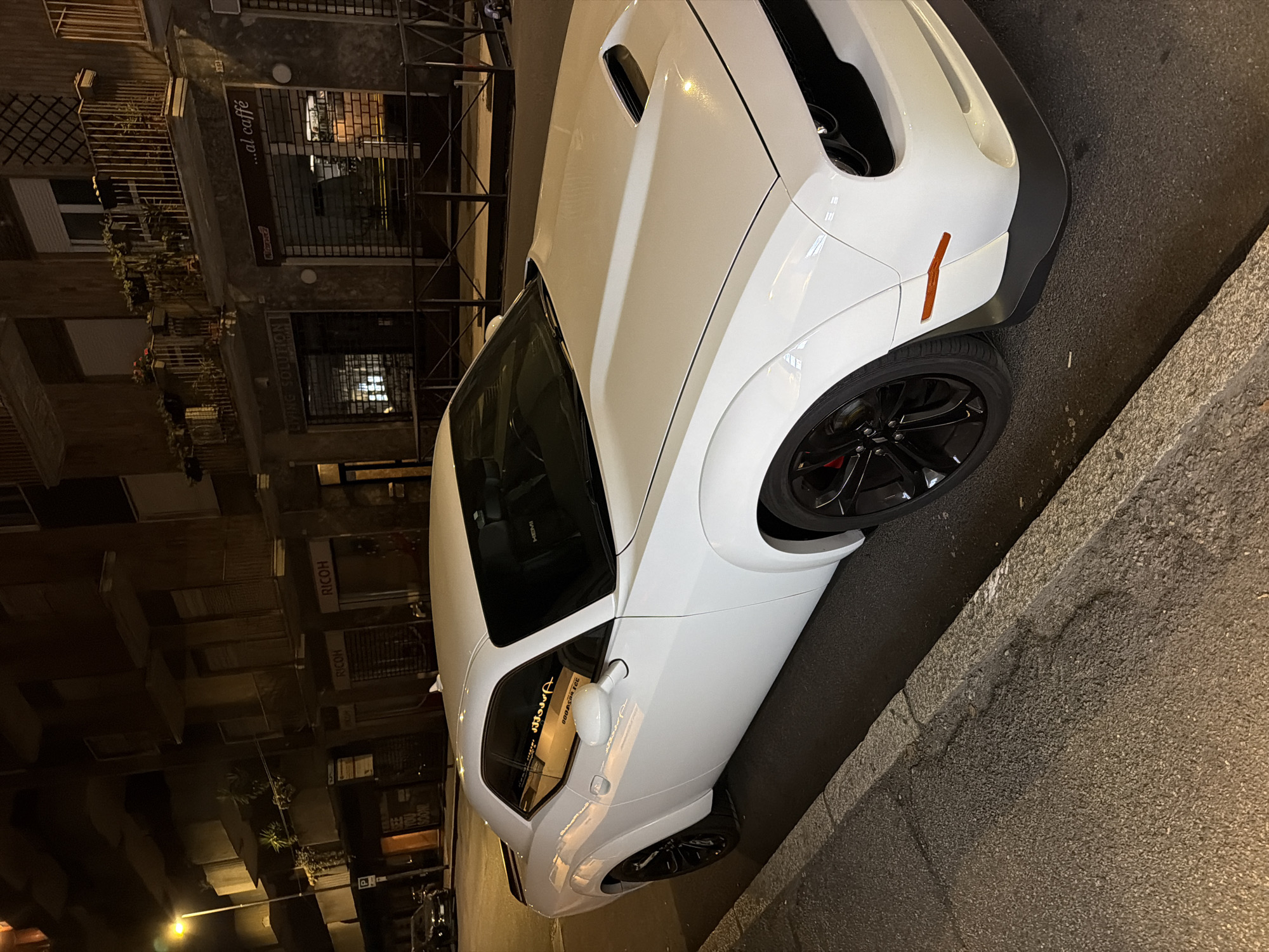 White Dodge Challenger and MV Agusta spotted on a Novara night