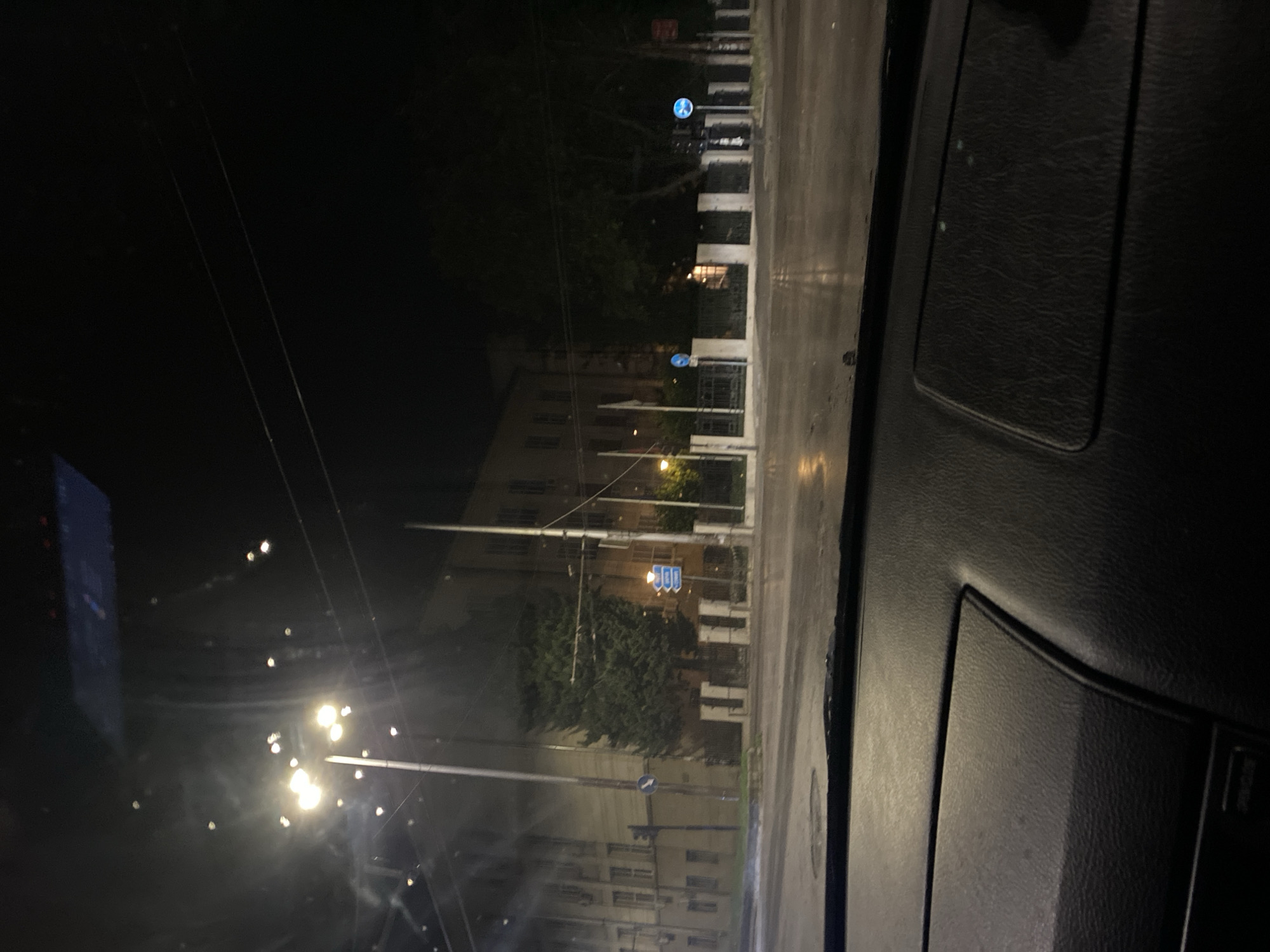 Night drive through wet Pleven streets