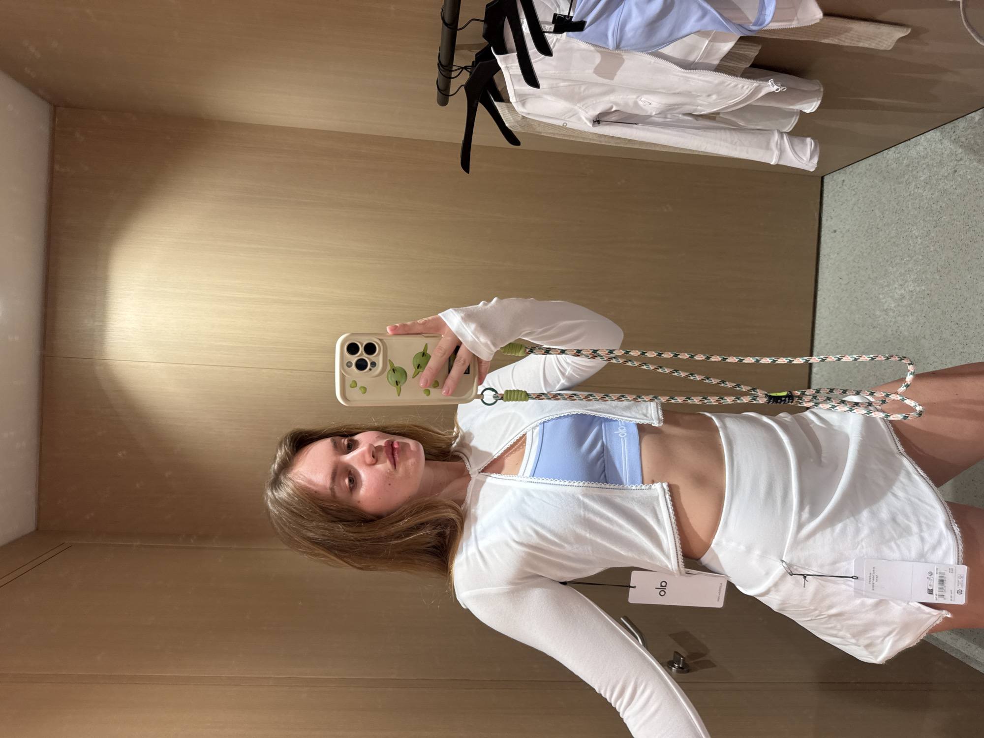 Woman takes fitting room selfies in Rome store